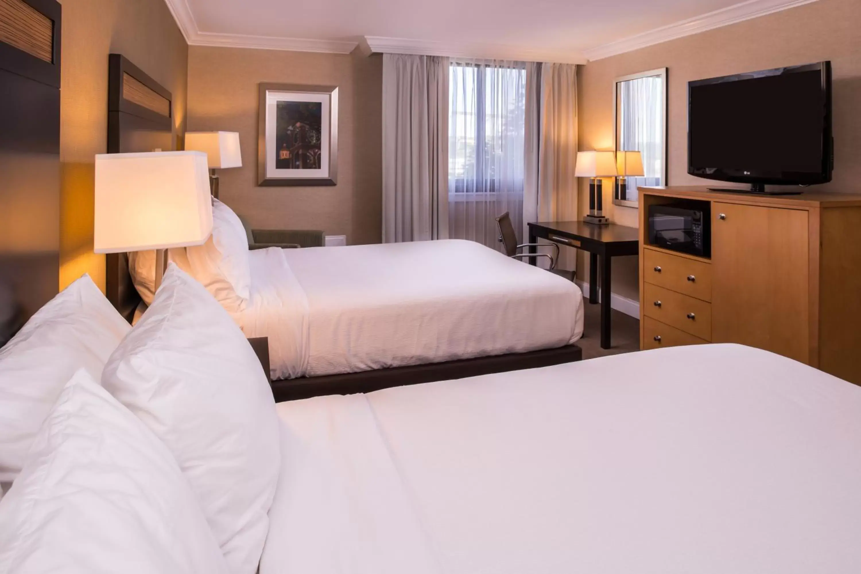 Bed in Holiday Inn Concord Downtown, an IHG Hotel Bed in Holiday Inn Concord Downtown, an IHG Hotel