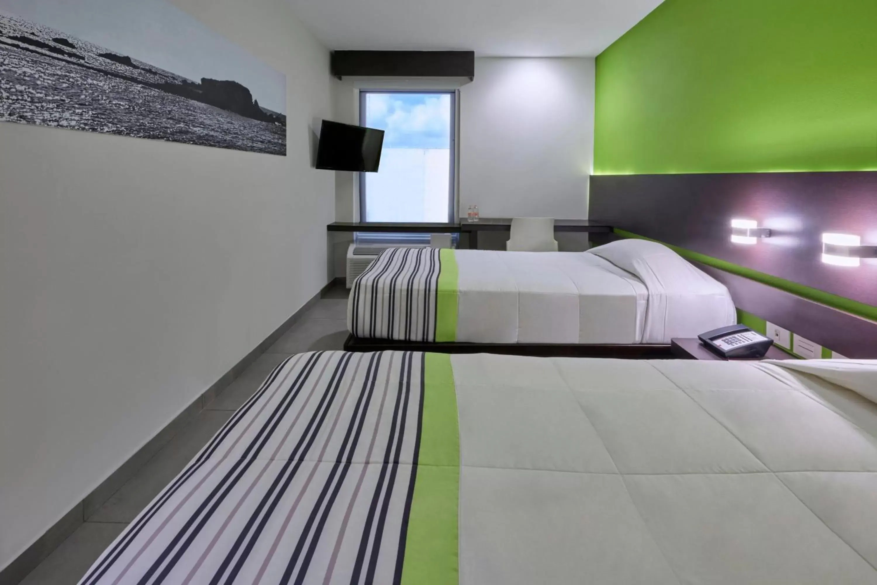 Photo of the whole room, Bed in City Express Junior by Marriott Cancun
