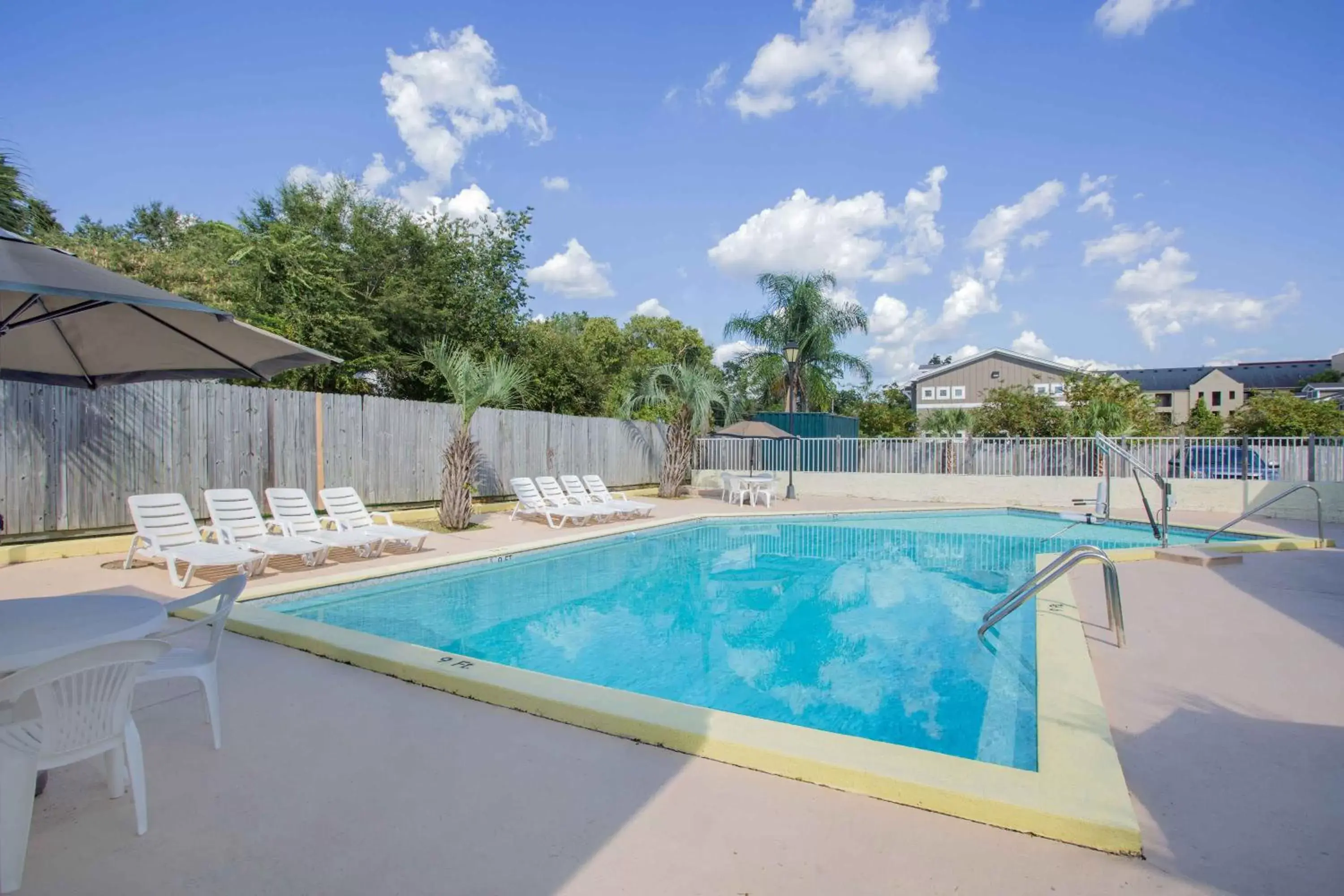 Swimming Pool in Days Inn by Wyndham Tallahassee University Center