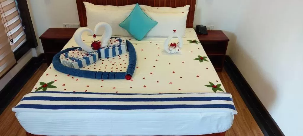 Bed in J7 Villaj Resort