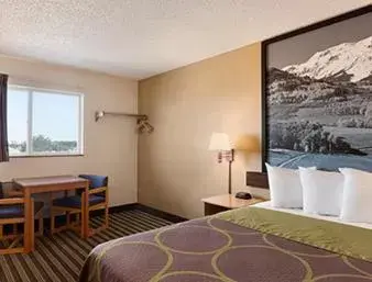 Studio Suite with Three Queen Beds - Non-Smoking in Travelodge by Wyndham Loveland/Fort Collins Area