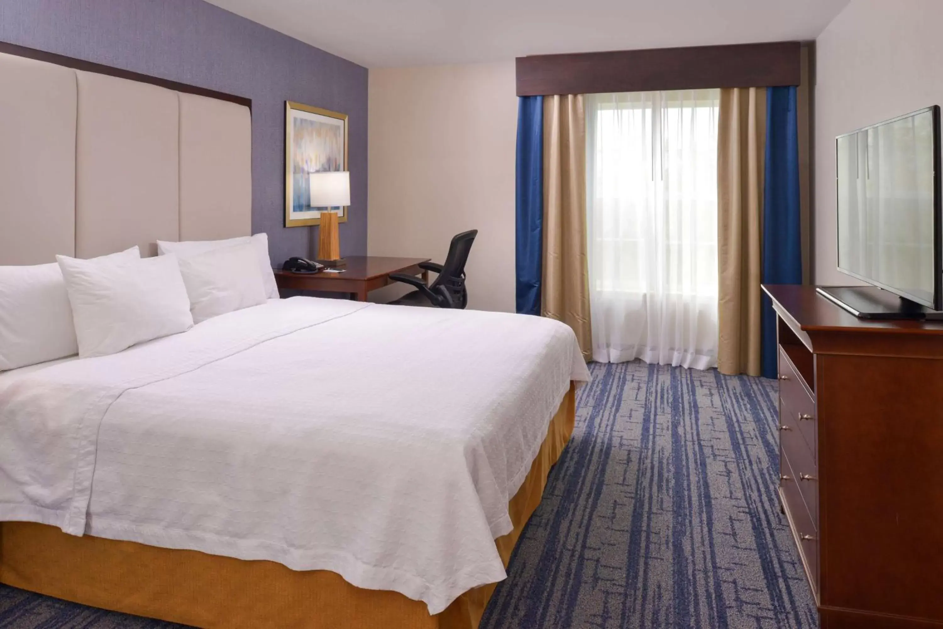 Bed in Homewood Suites by Hilton Dallas-Lewisville