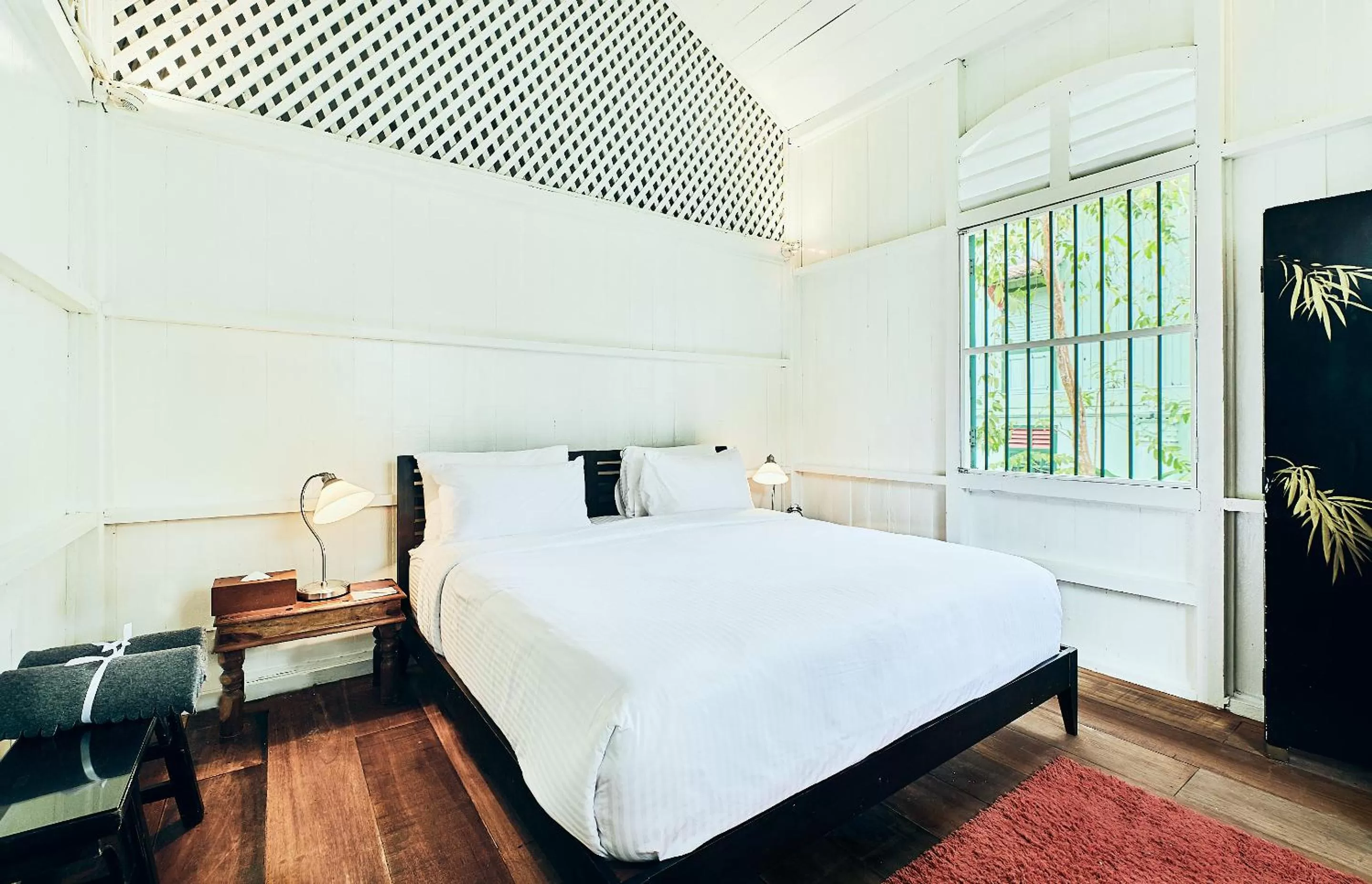 Bed in Temple Tree Resort