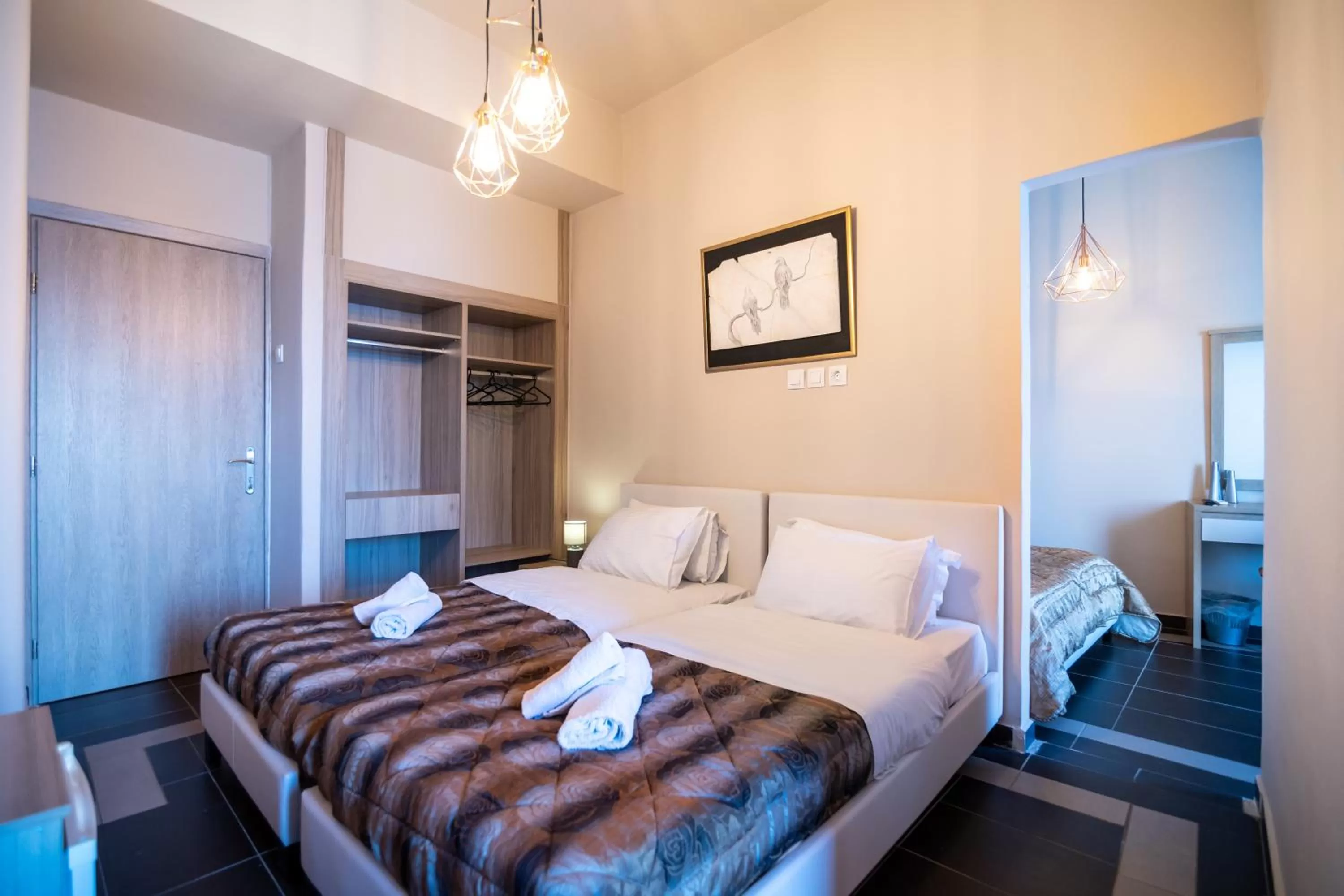 Bed in Votsalakia Hotel & Luxury Apartments