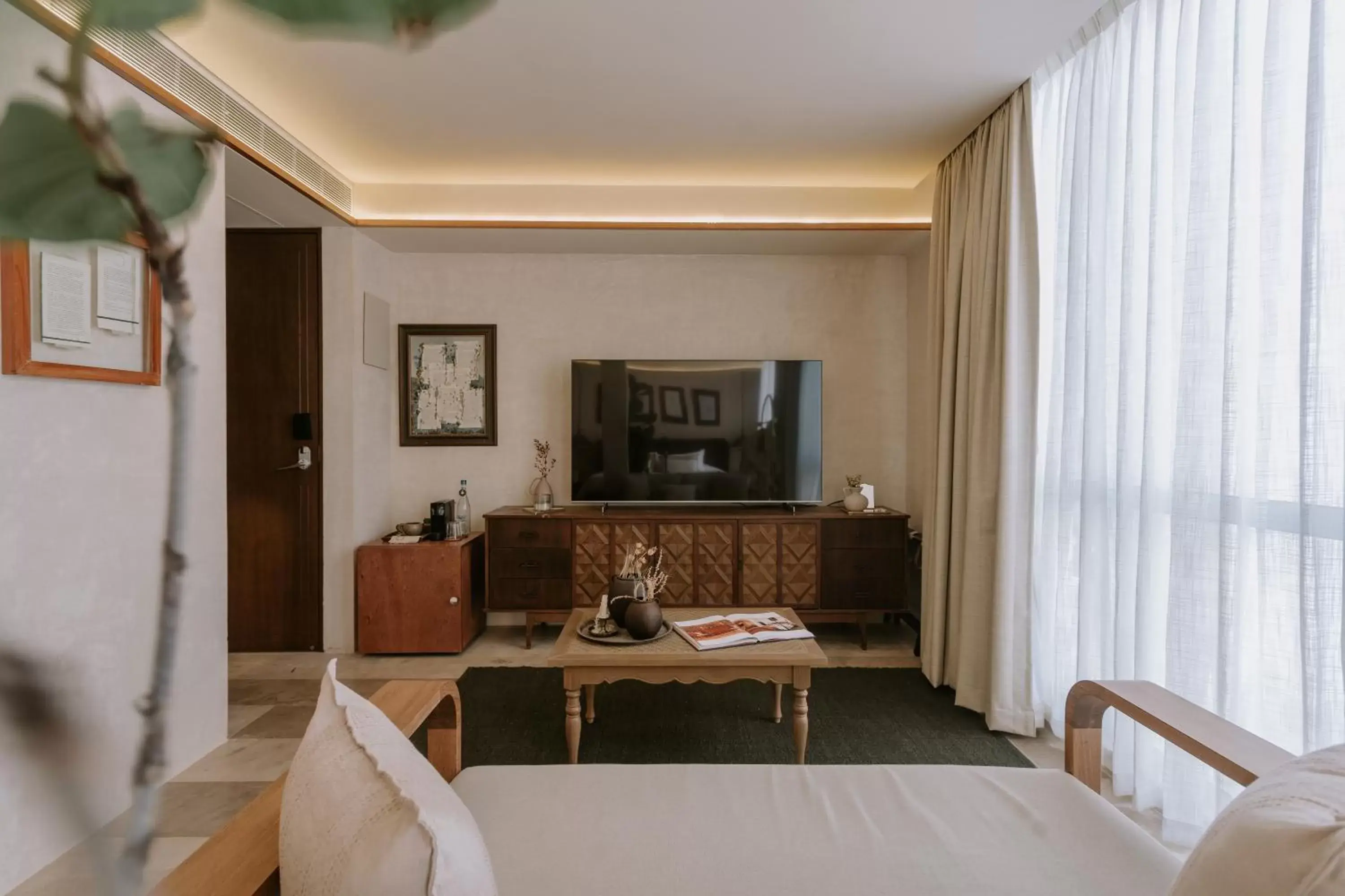 TV and multimedia, Seating Area in Hotel Sureño Yucatan