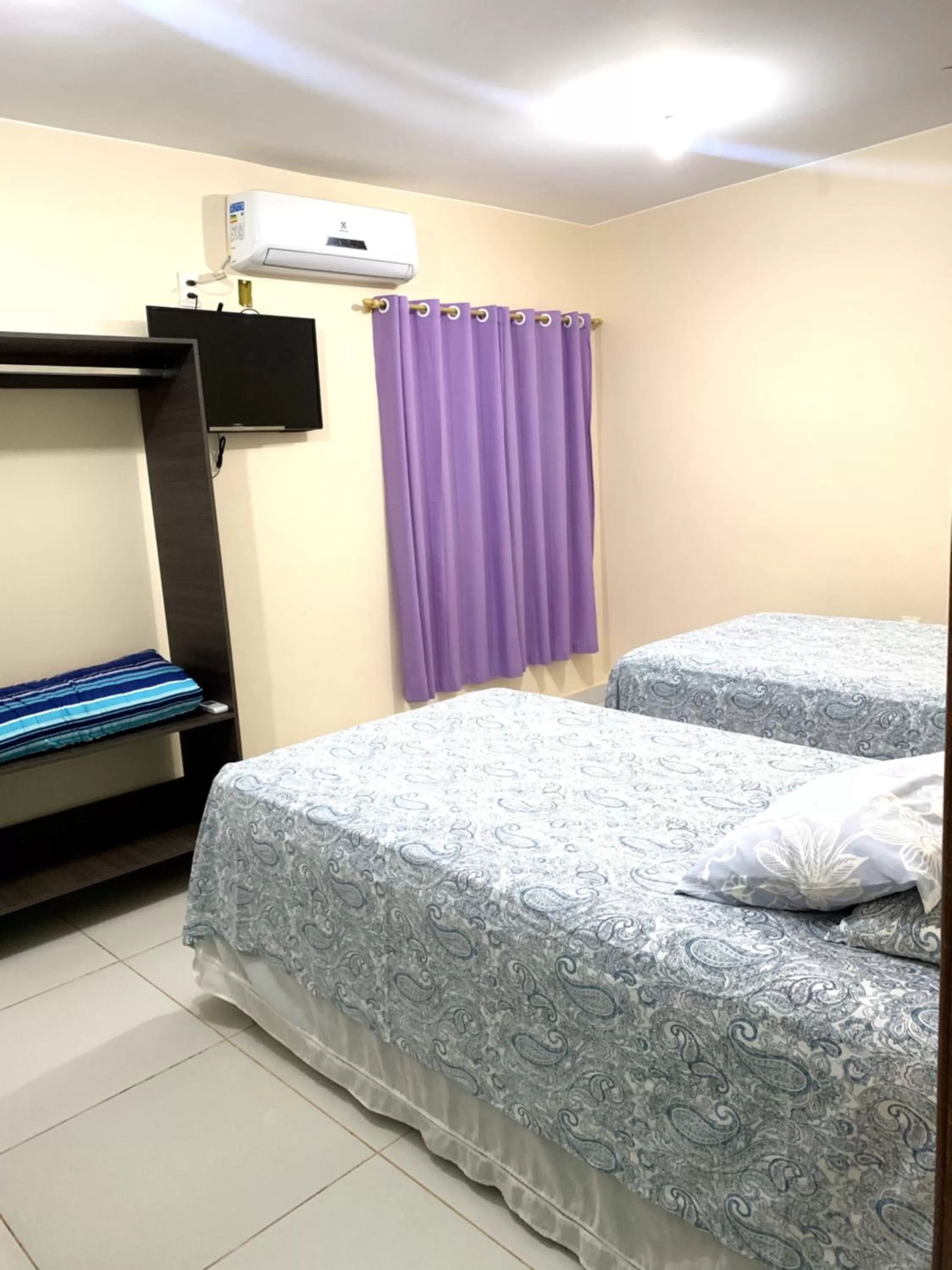 Bed in Pousada Jardim Brasília