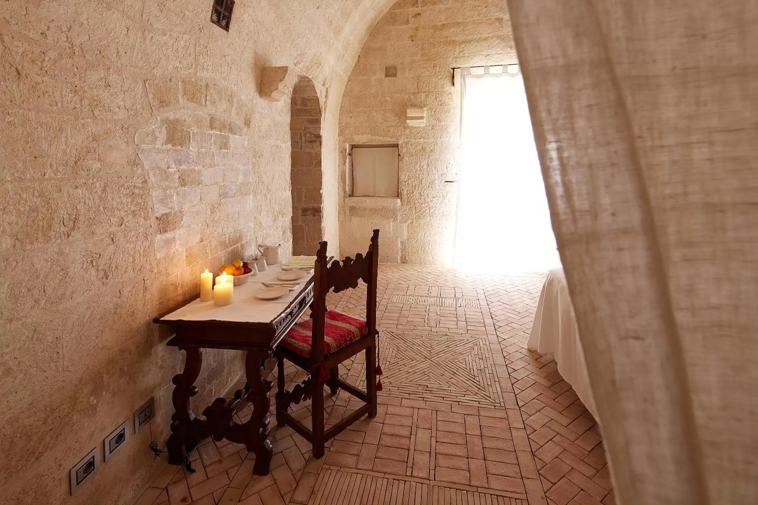 Seating area in Sextantio Le Grotte Della Civita