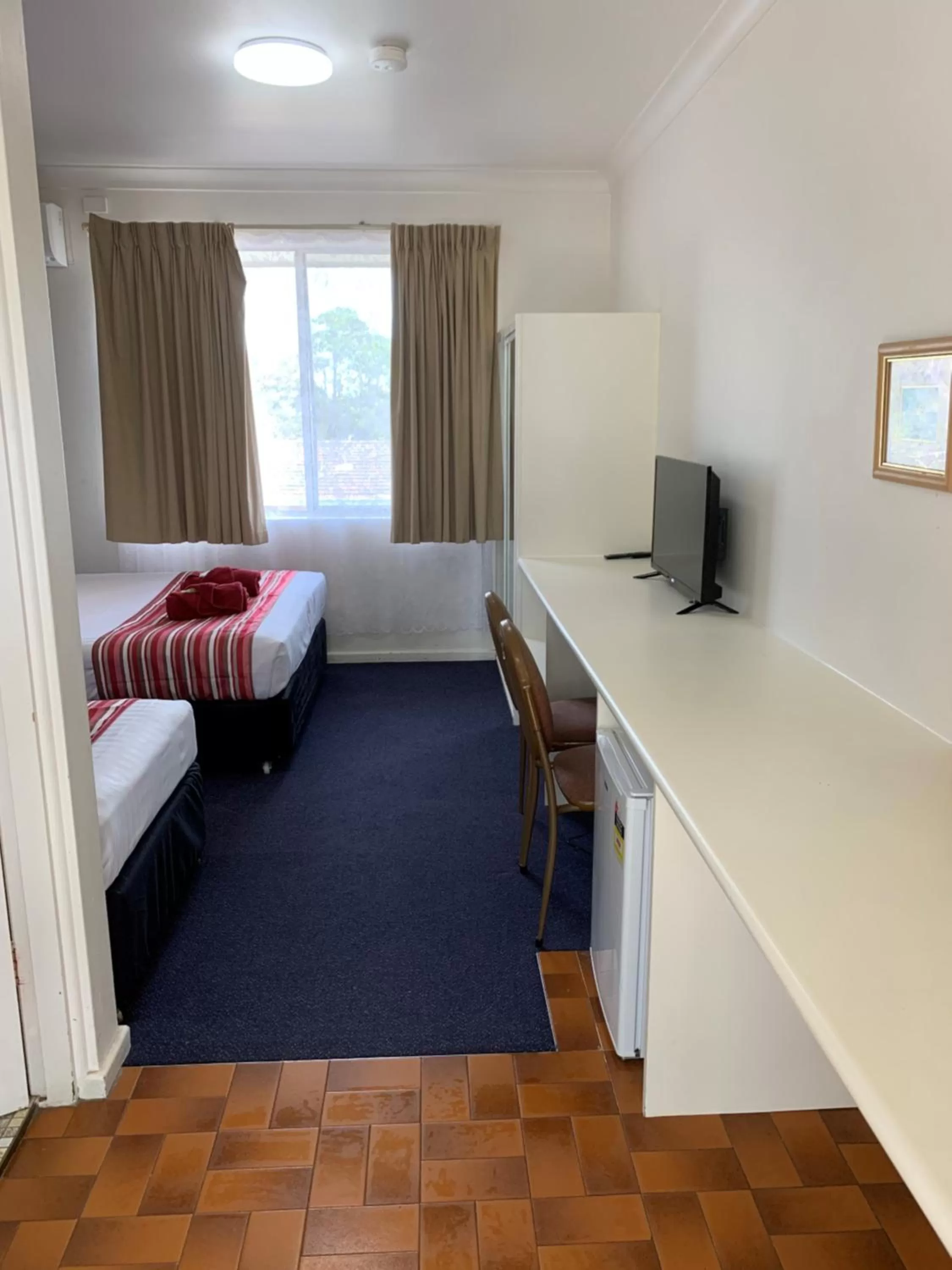 Bed in Panorama Motor Inn