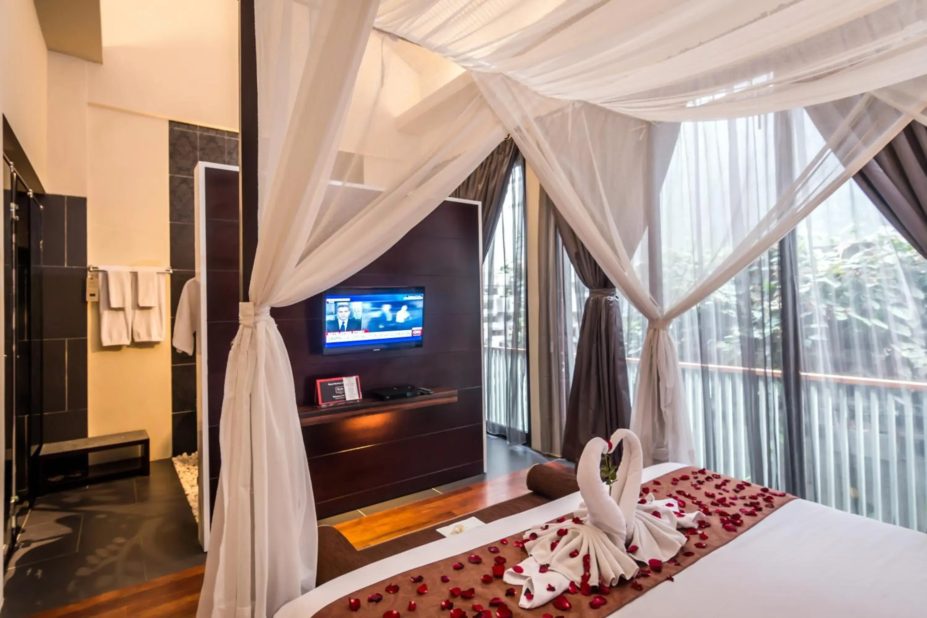 Bed, TV/Entertainment Center in 18 Suite Villa Loft at Kuta