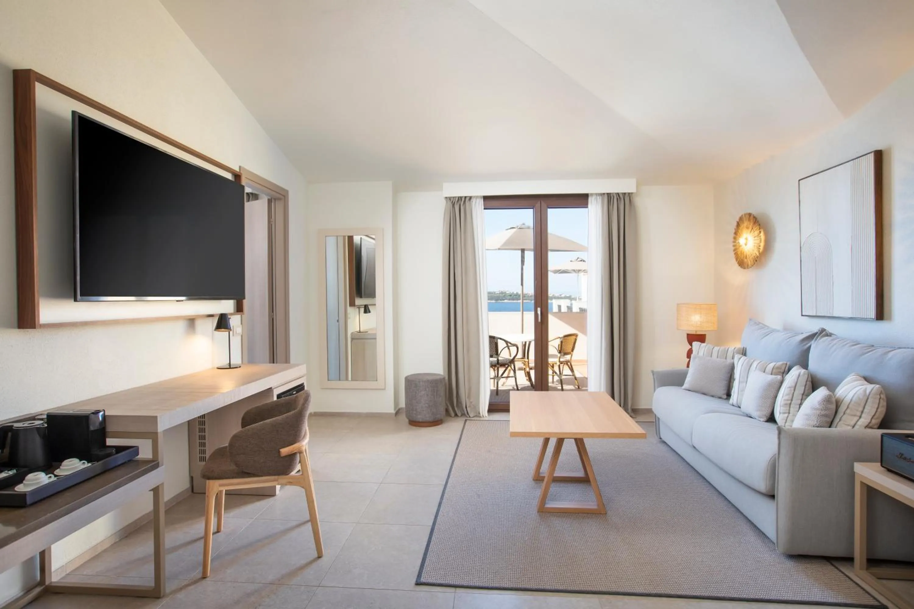 Photo of the whole room in Mangia's Santa Teresa Sardinia, Curio Collection by Hilton