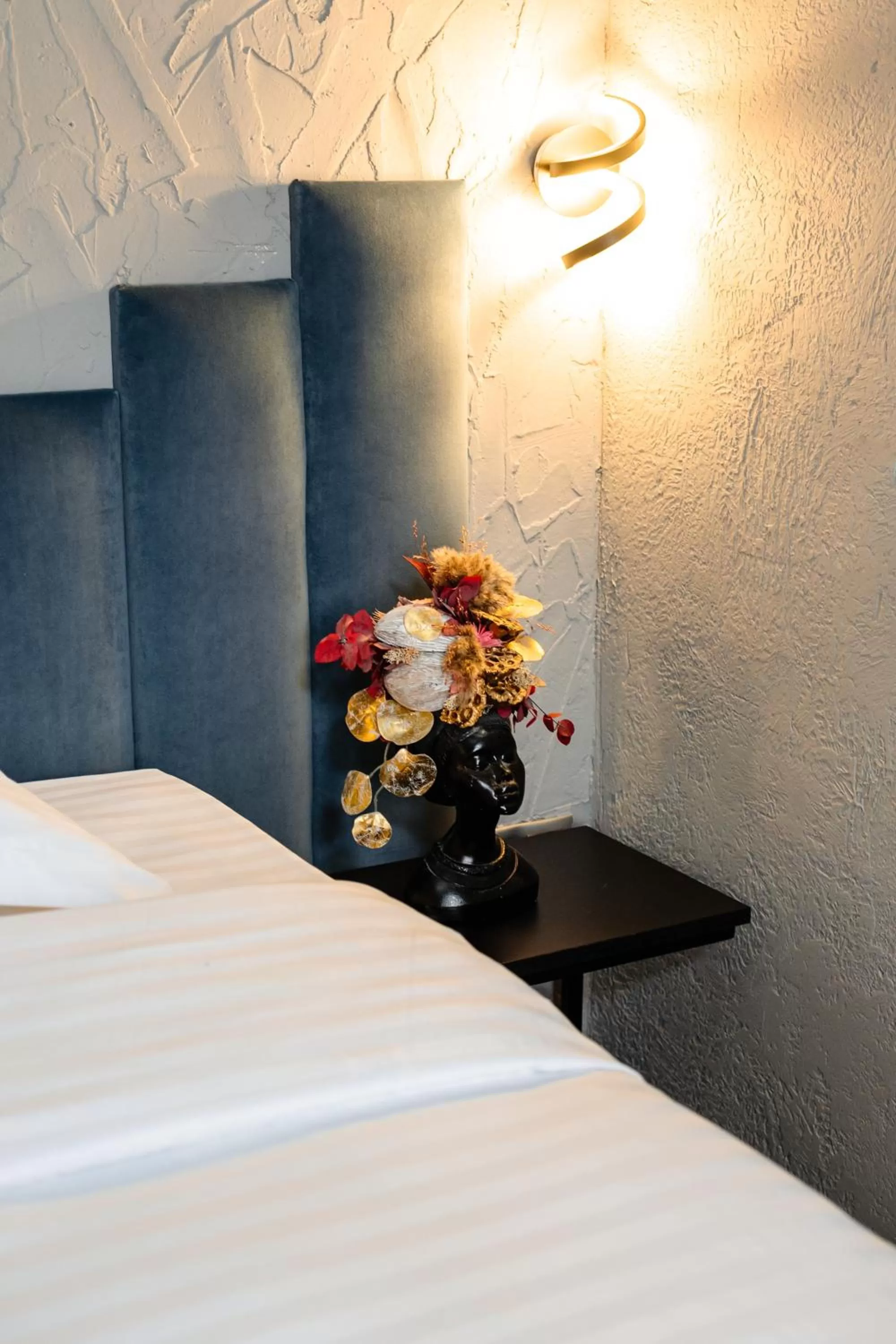 Decorative detail, Bed in Palace Bulevard Inn