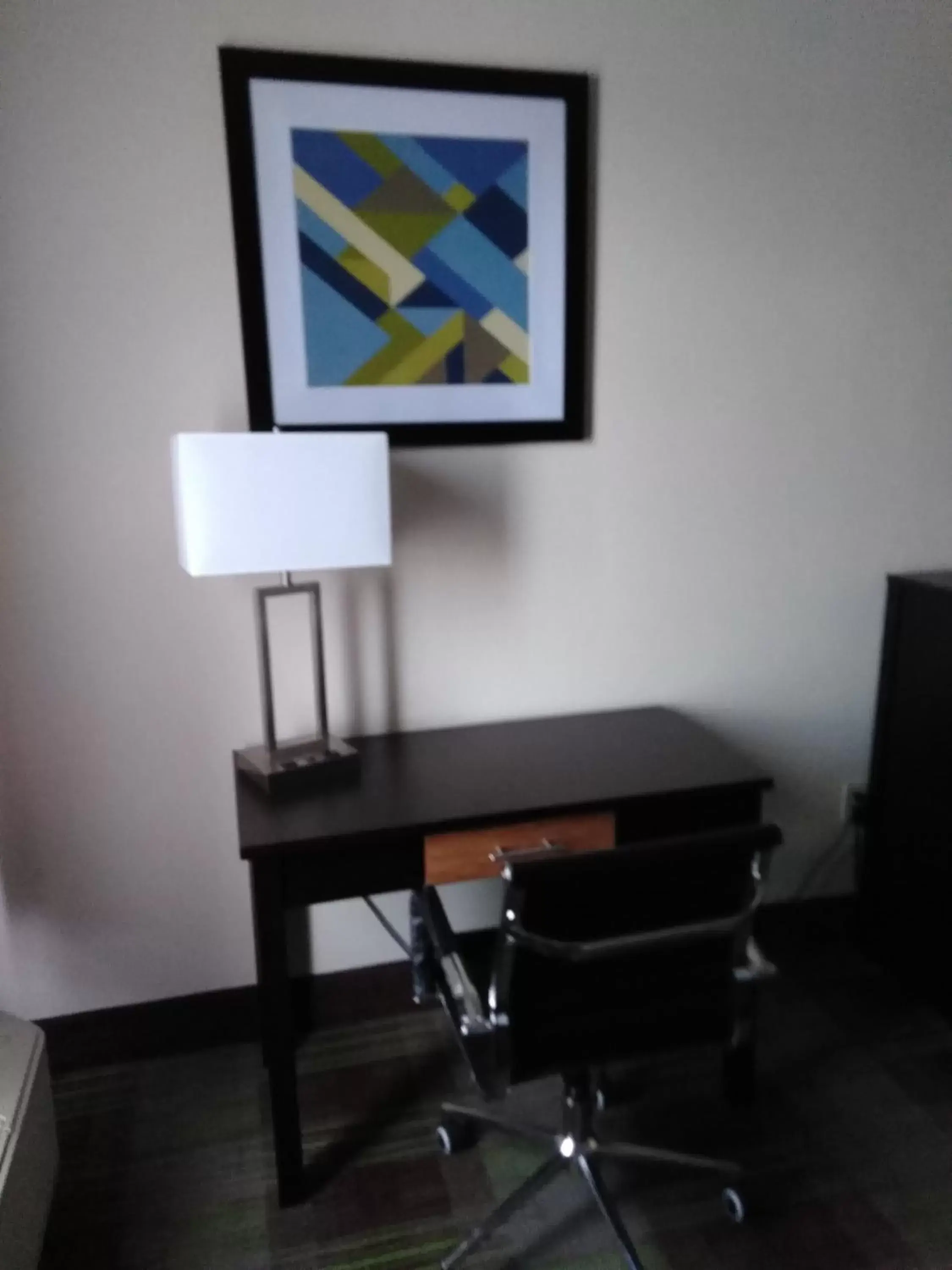 Seating area, TV/Entertainment Center in Quality Inn & Suites