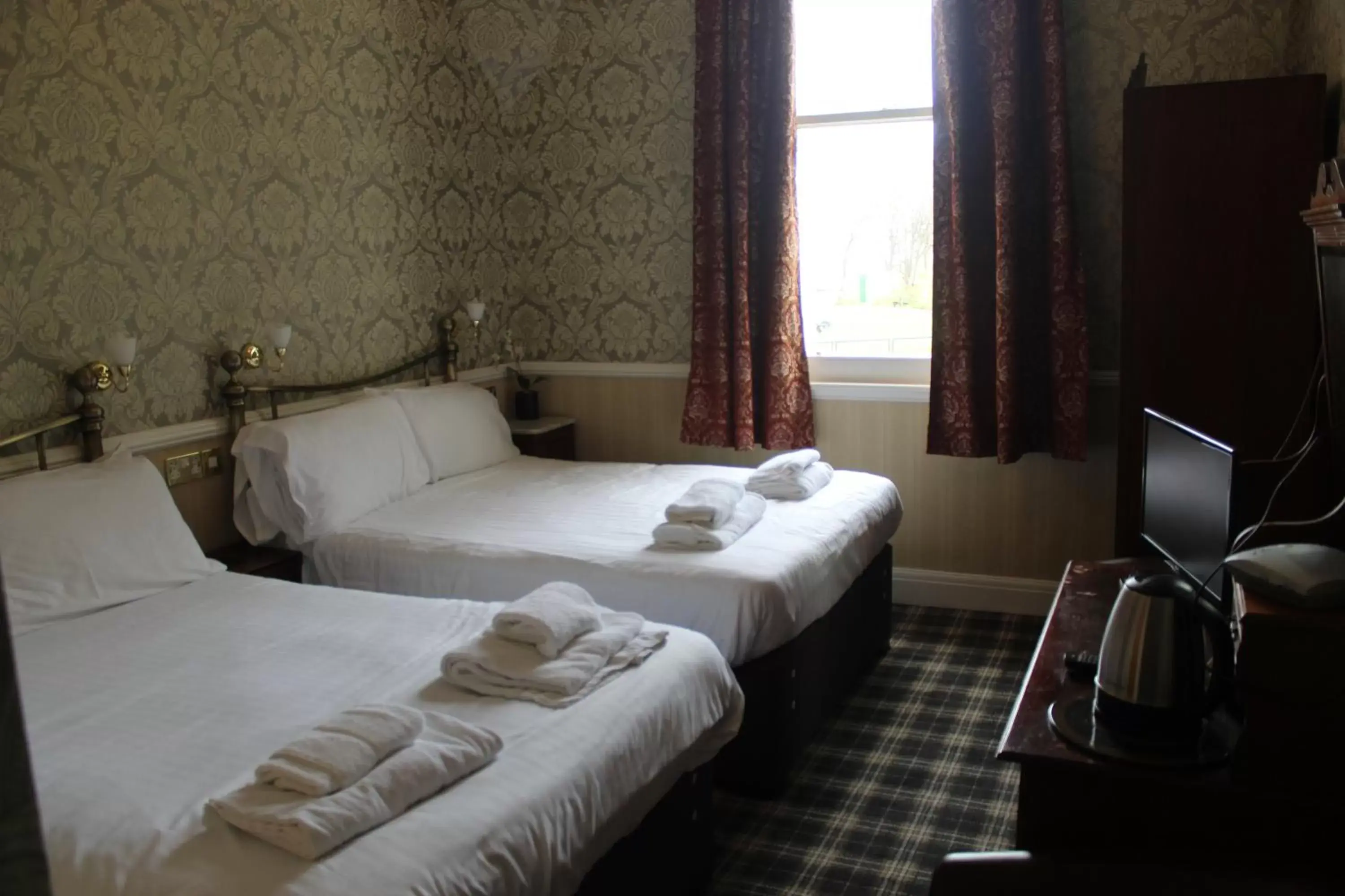 Bed in Headlands Hotel