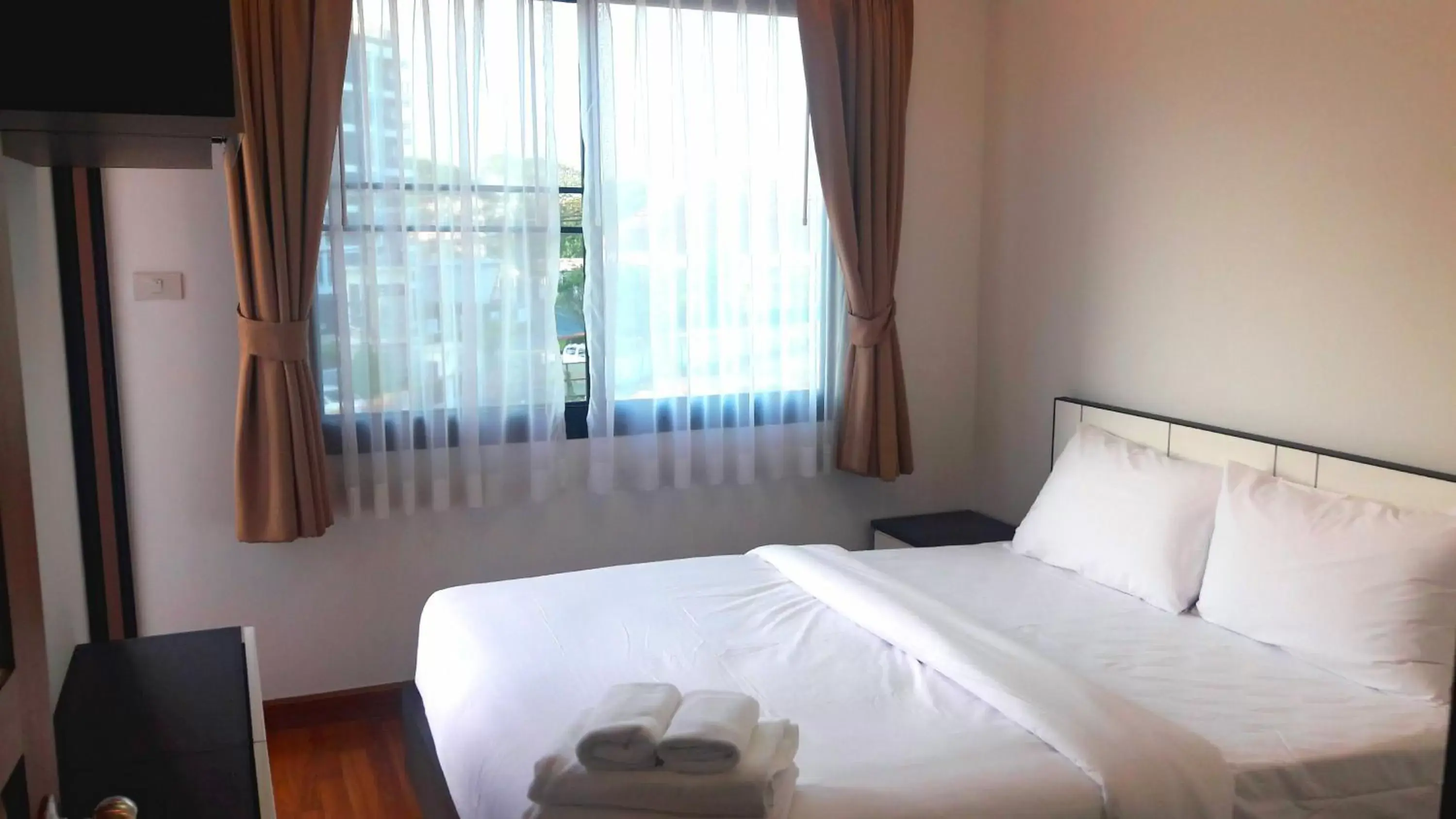 Bed in V-twin Donjan Service Apartment Bed in V-twin Donjan Service Apartment