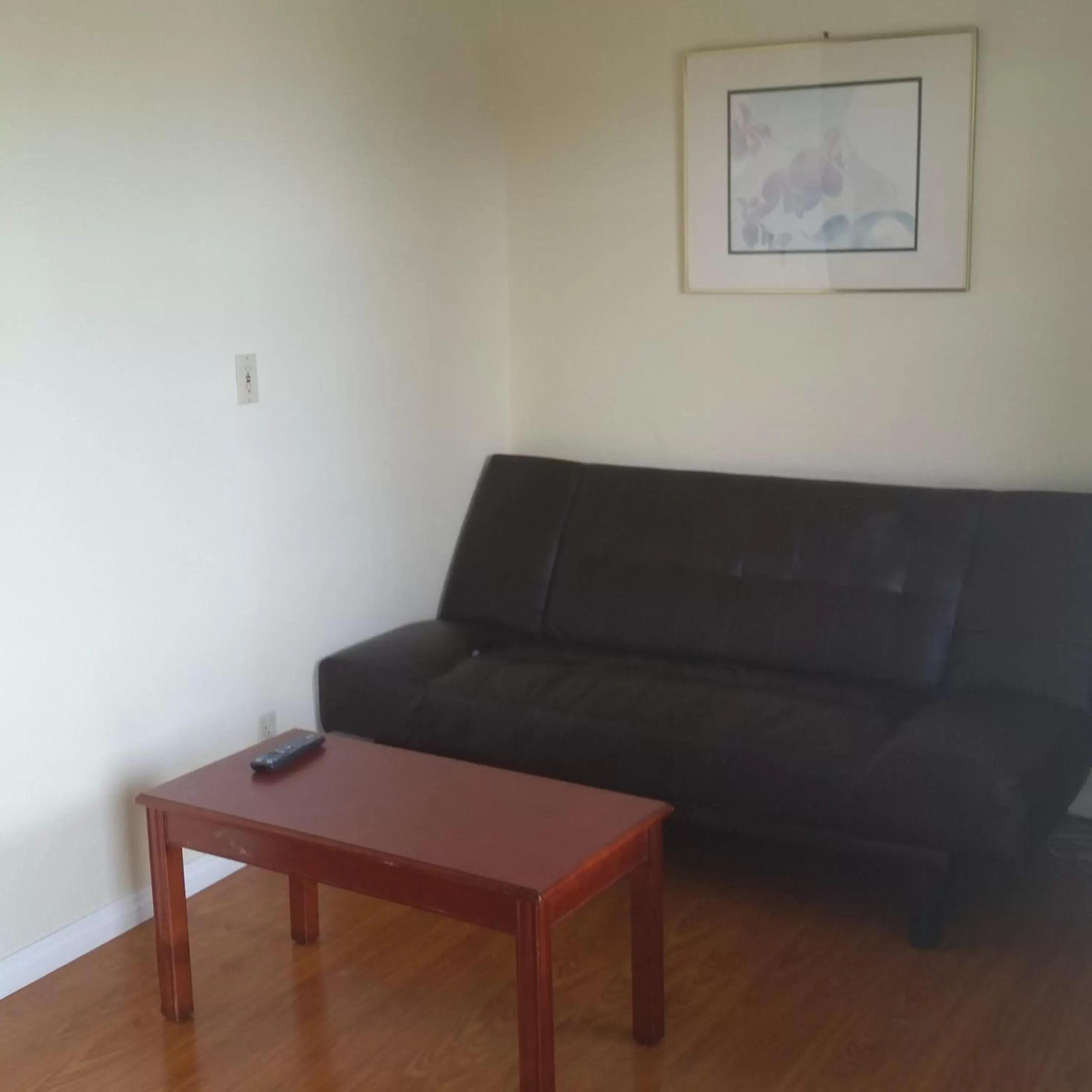 Living room, Seating Area in Days Inn by Wyndham Orange Anaheim