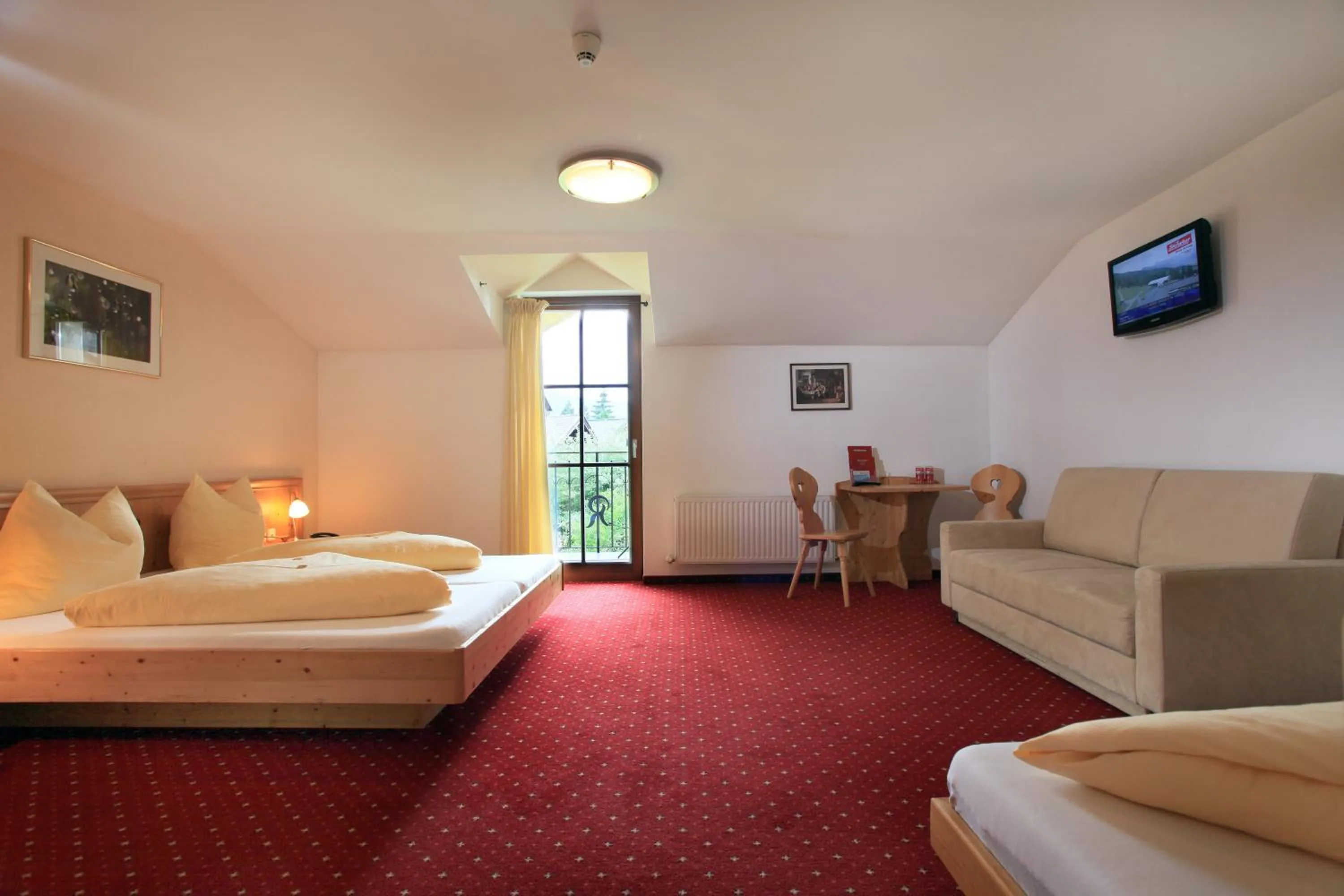 Photo of the whole room, Bed in Hotel Reitlwirt