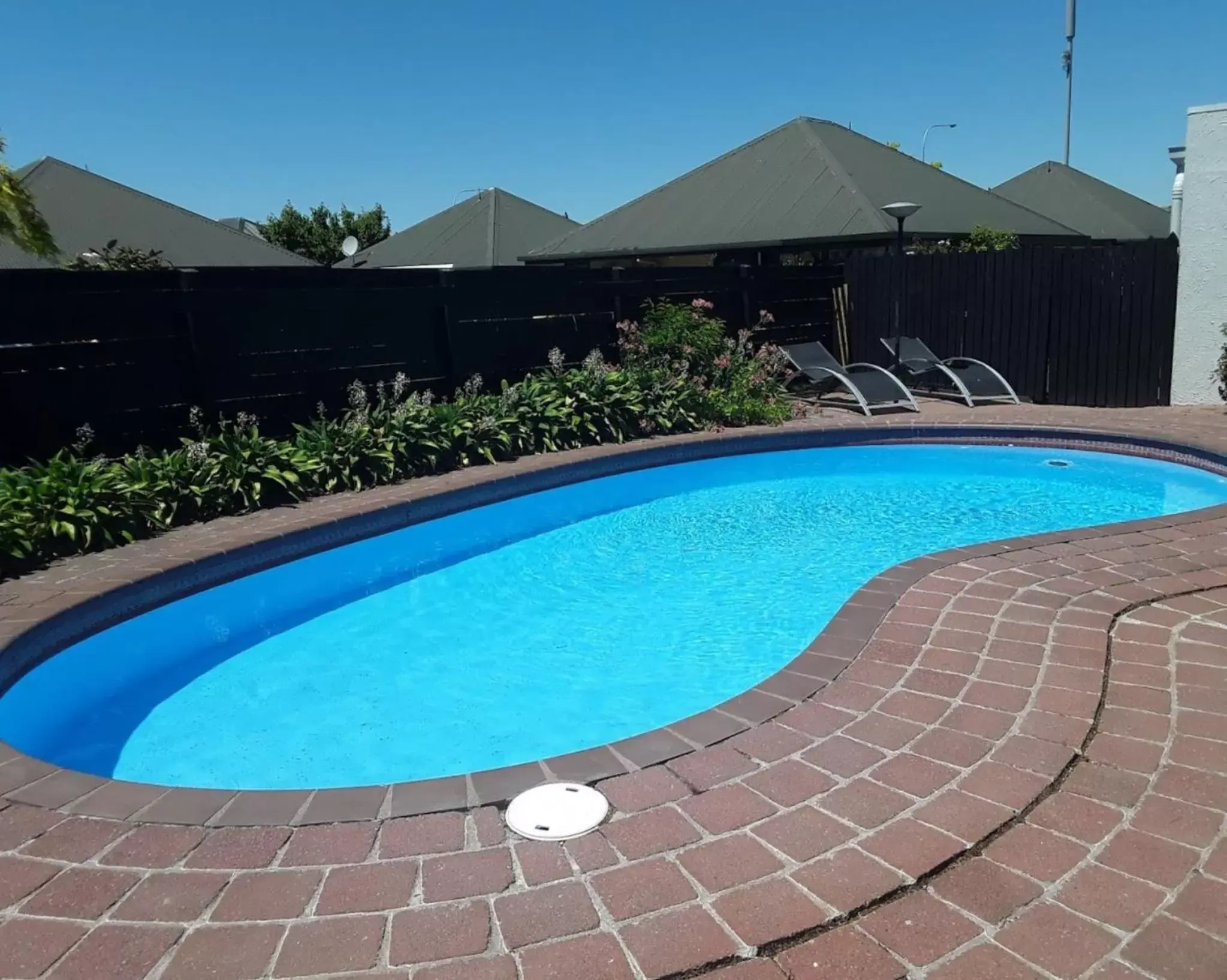 Swimming Pool in ASURE Sundowner Motel
