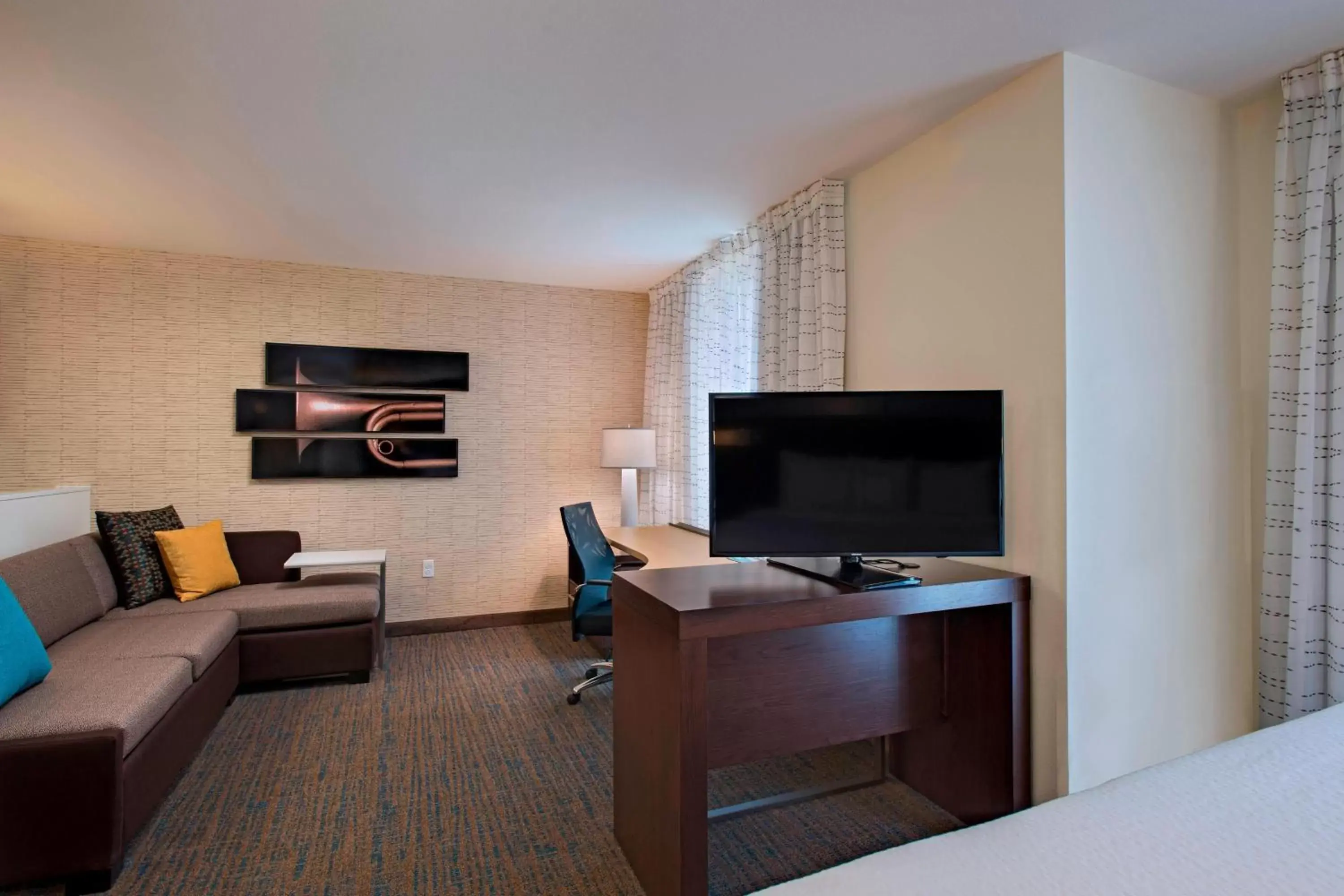 Photo of the whole room, TV/Entertainment Center in Residence Inn by Marriott Jackson The District at Eastover