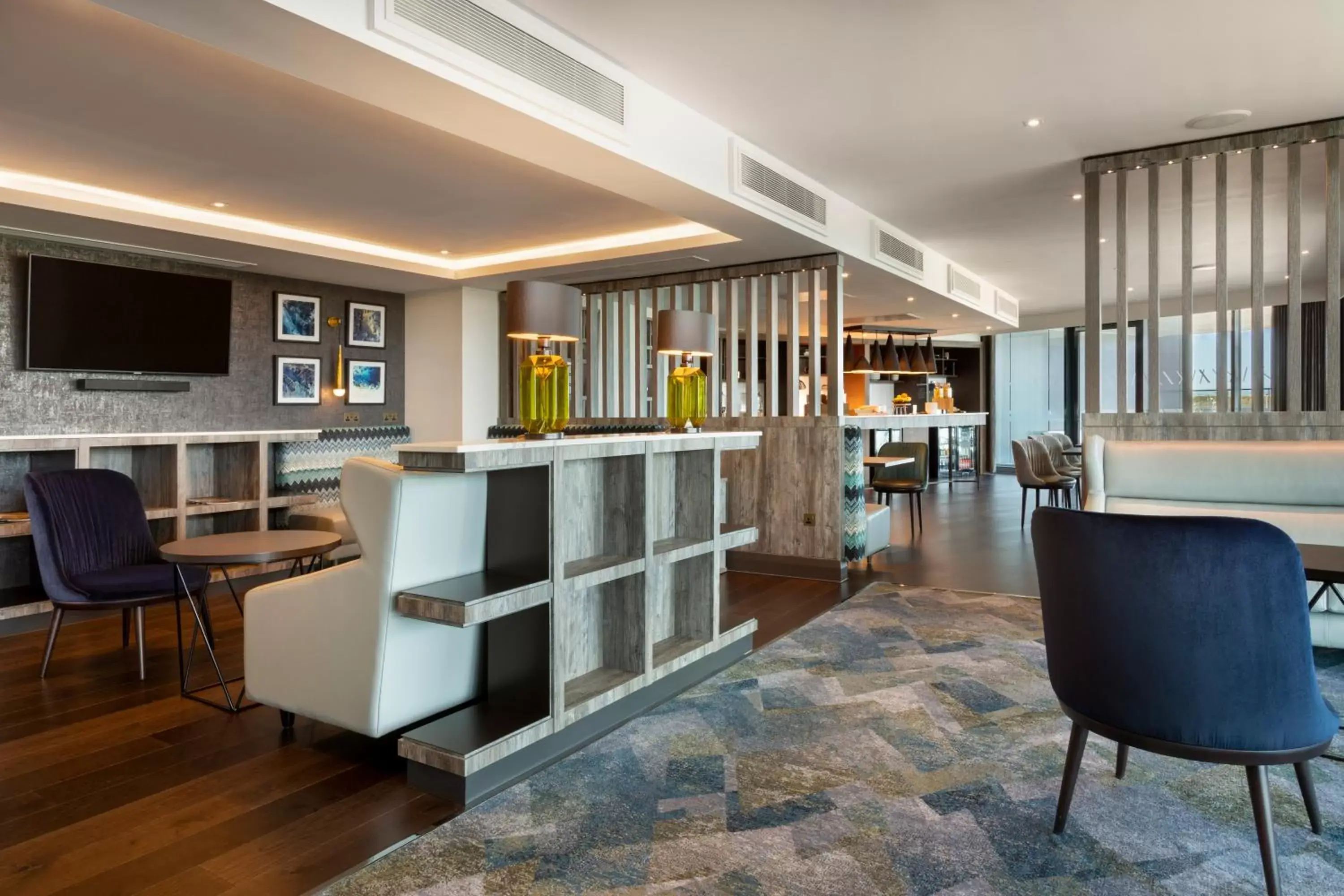 Communal lounge/ TV room, Lobby/Reception in Hilton Aberdeen TECA