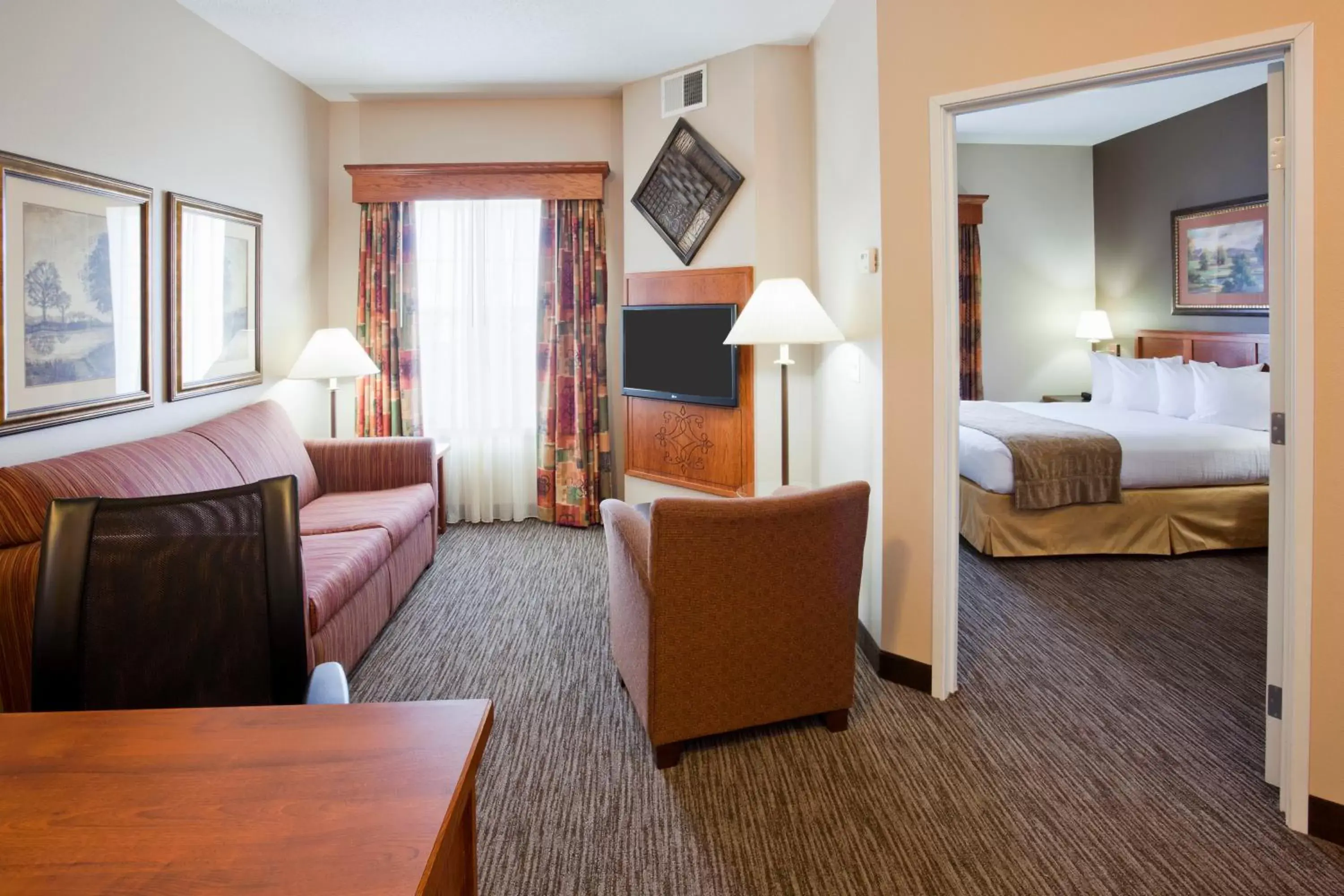 Bed in GrandStay Residential Suites Rapid City