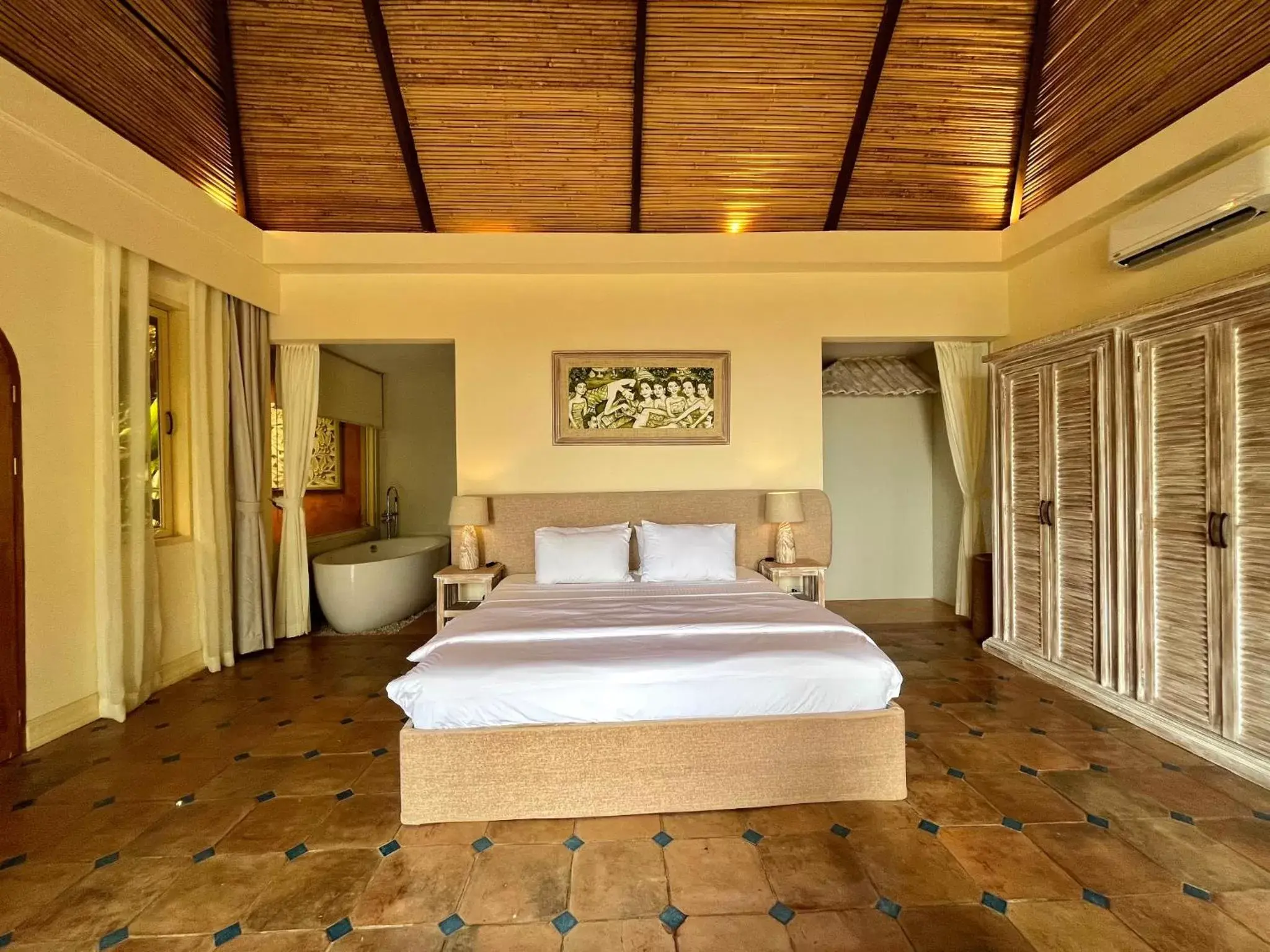 Bed in Coco Grove Beach Resort, Siquijor Island