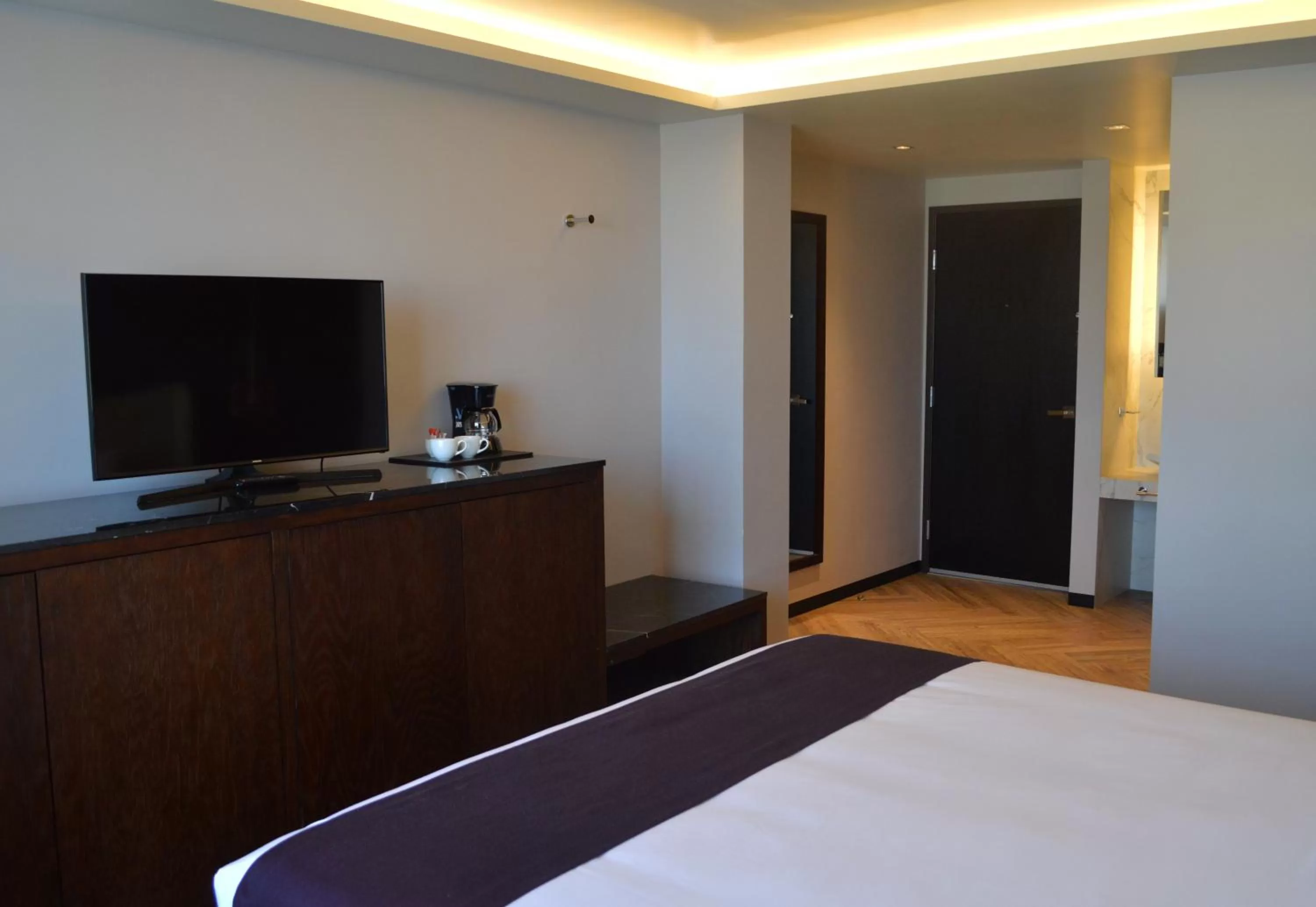 Communal lounge/ TV room, Bed in Casa Basalto