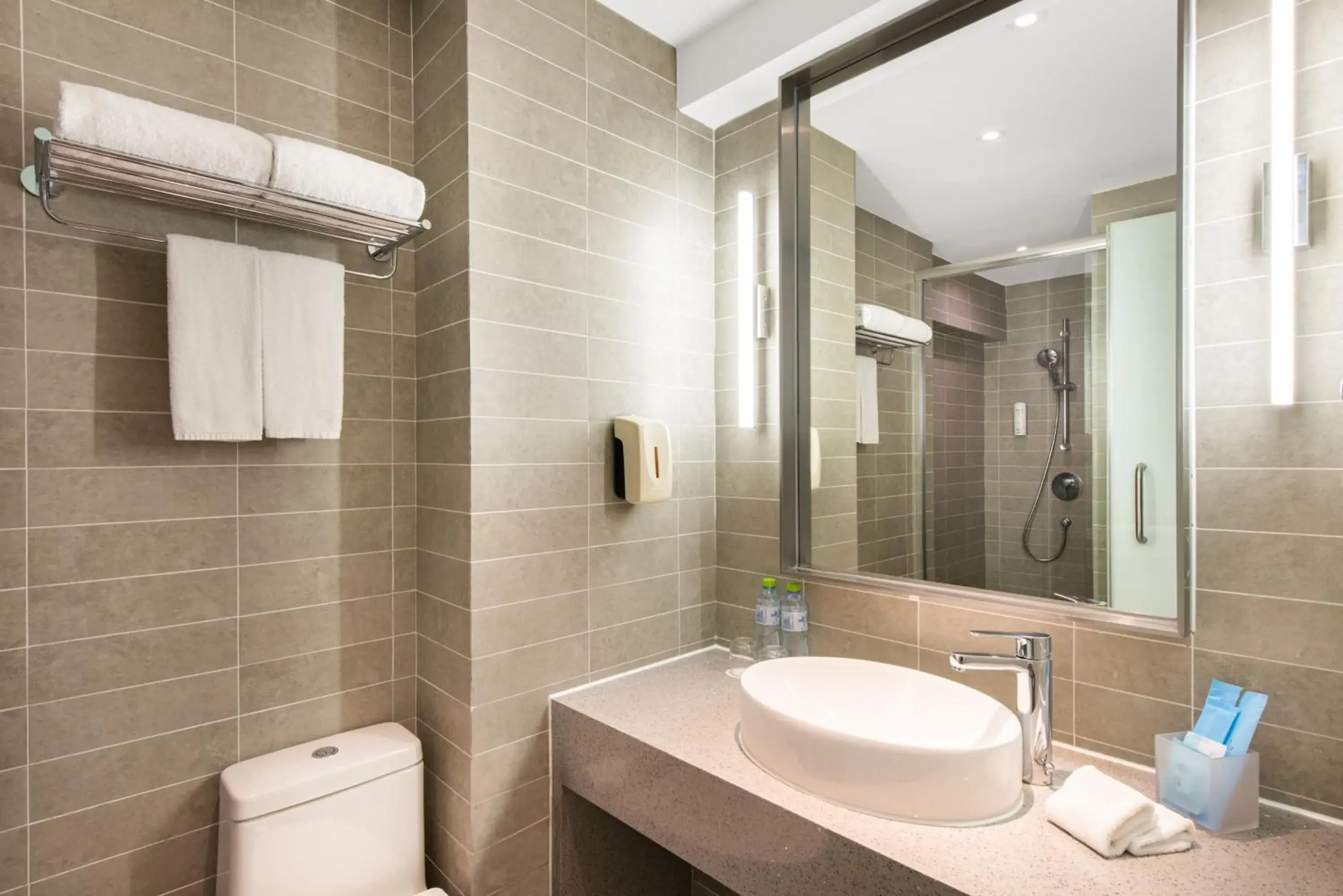 Bathroom in Holiday Inn Express Haikou West Coast, an IHG Hotel