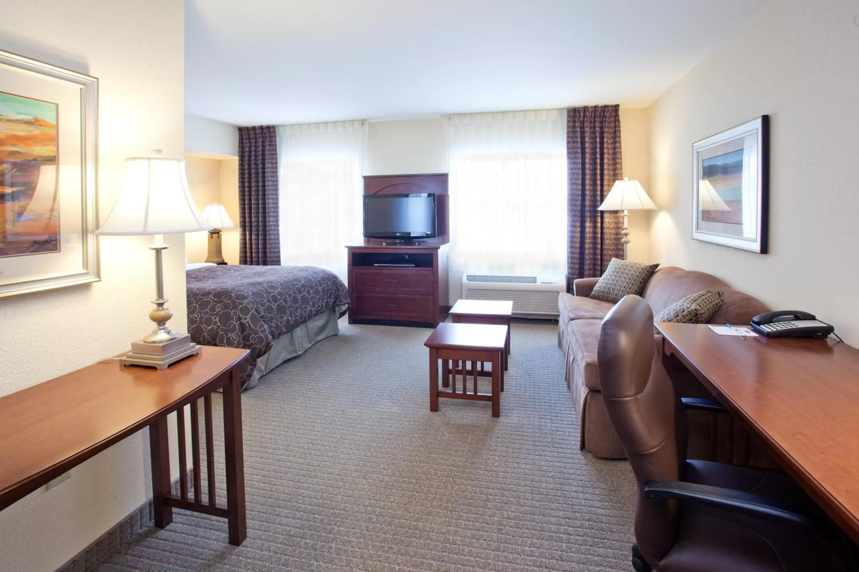 Photo of the whole room, TV/Entertainment Center in Staybridge Suites Great Falls, an IHG Hotel