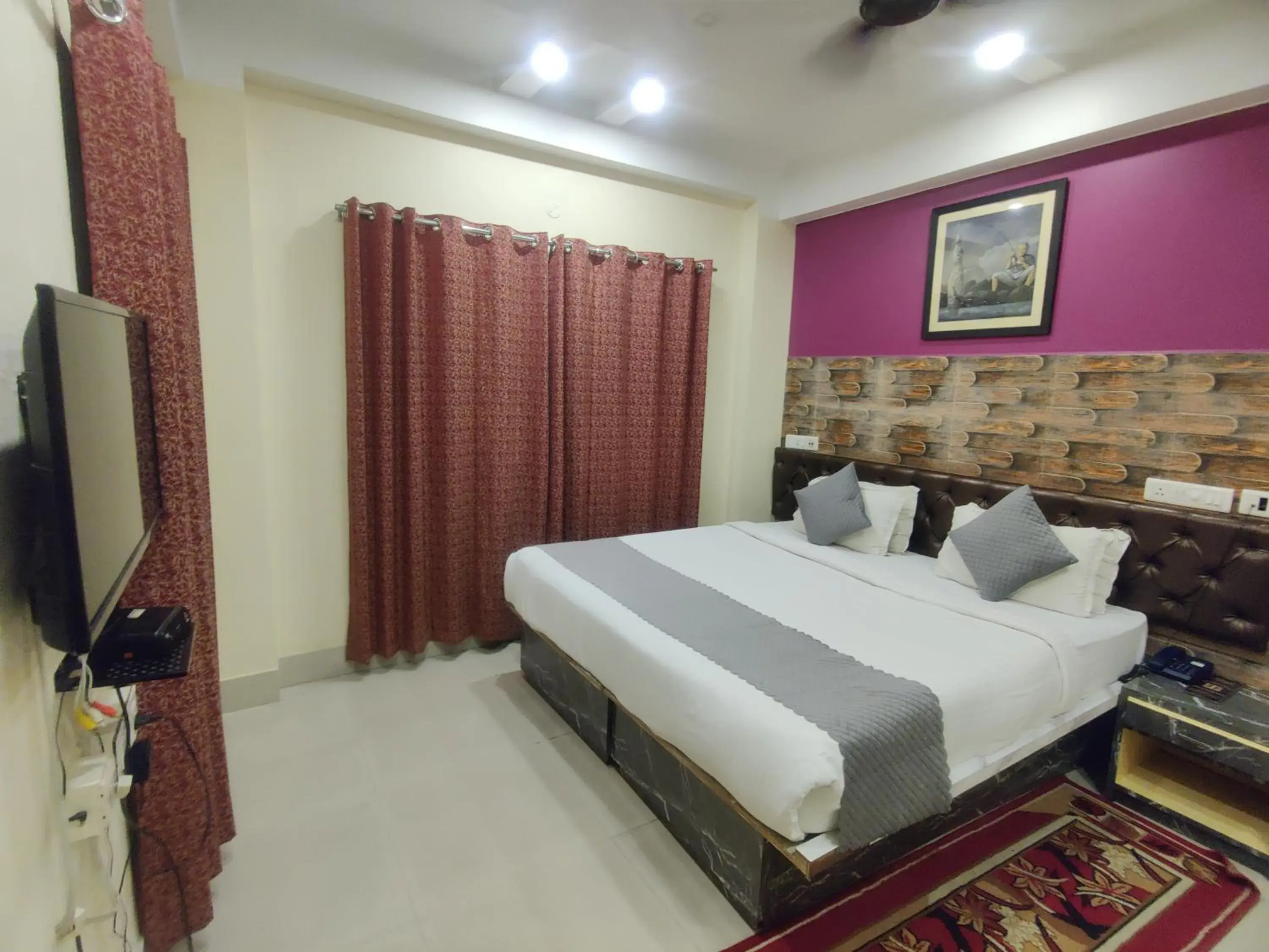 Bed in Hotel Swastik Regency