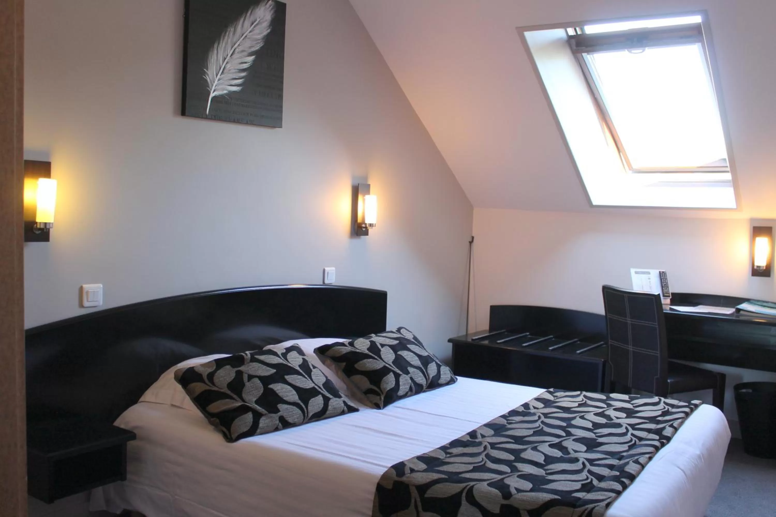 Bed in Hôtel Le Bayeux