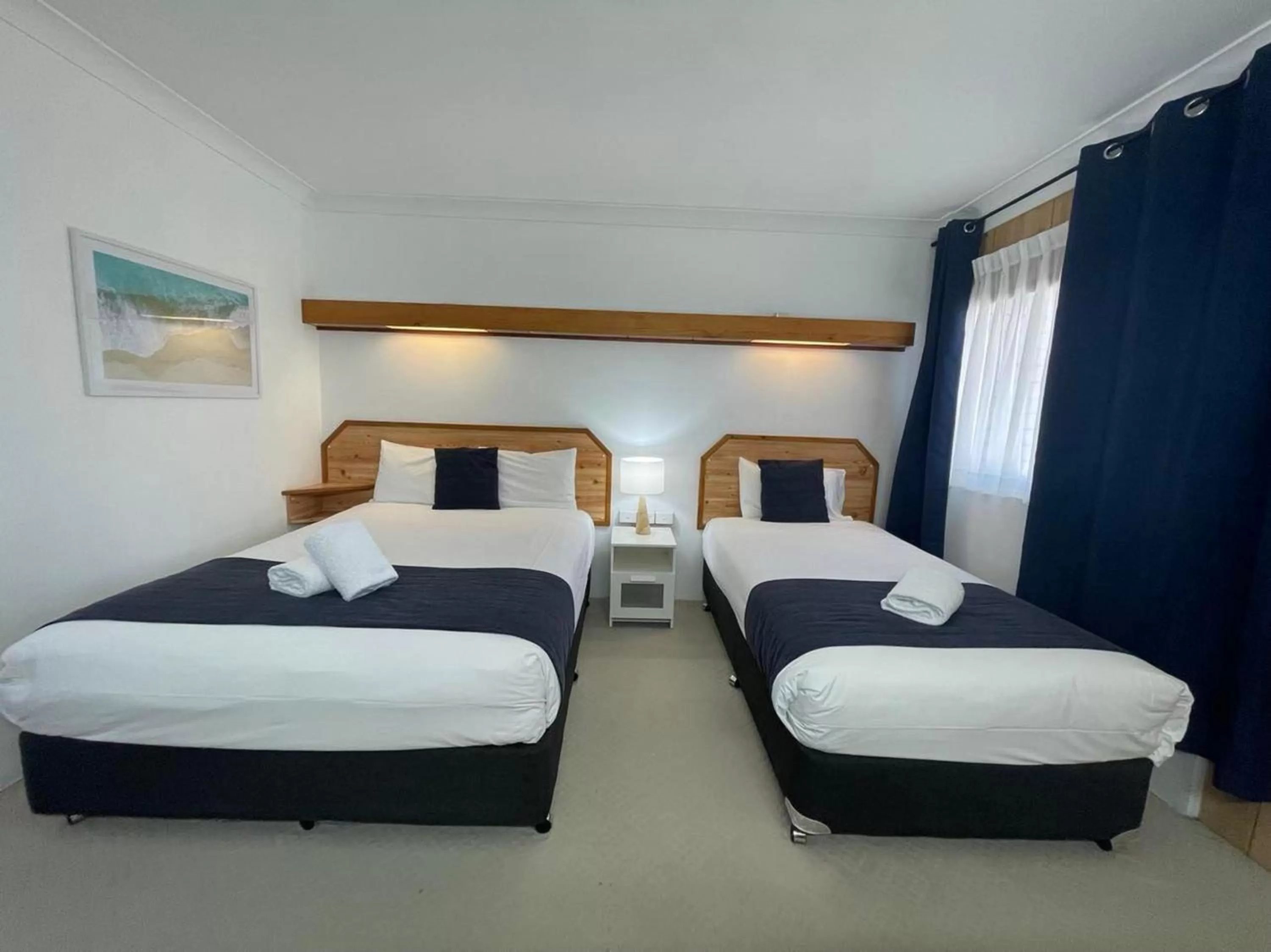 Bed in Forster Motor Inn