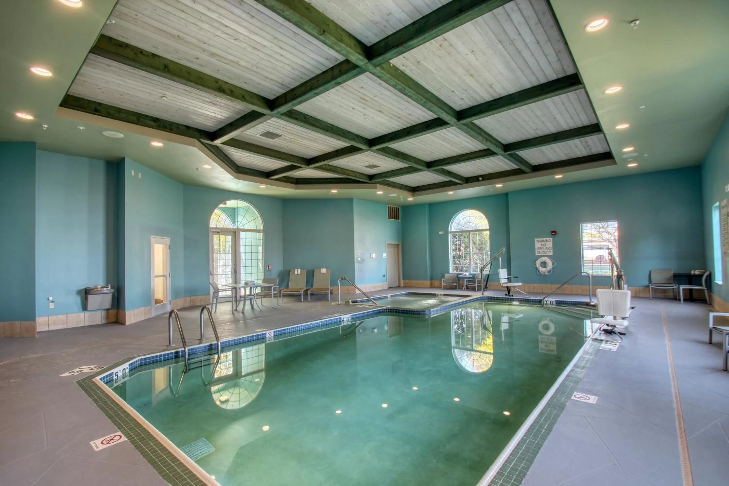 Swimming pool in Holiday Inn Express Hotel & Suites Oshkosh - State Route 41 by IHG