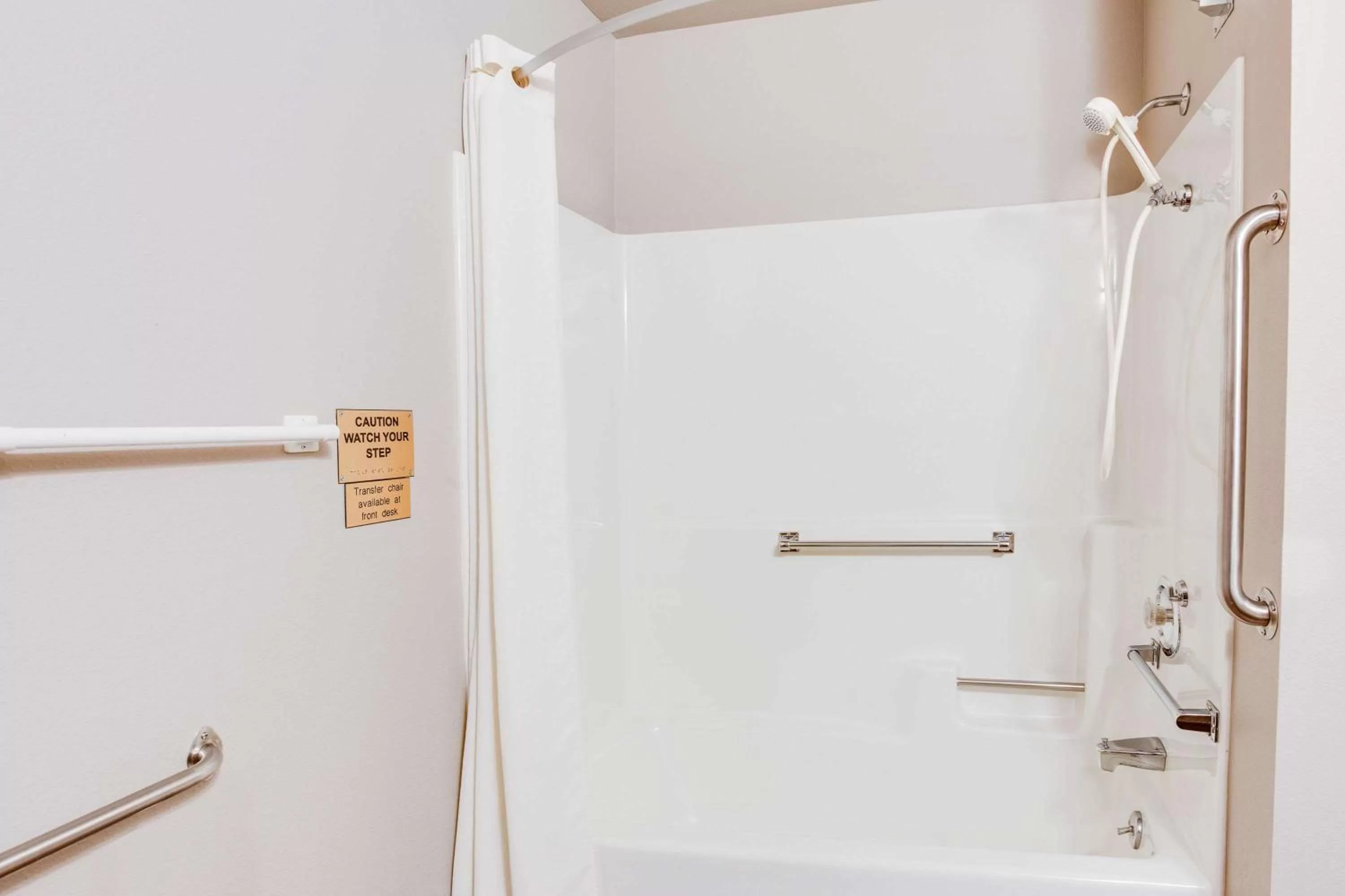 Bathroom in Super 8 by Wyndham Green Bay Near Stadium