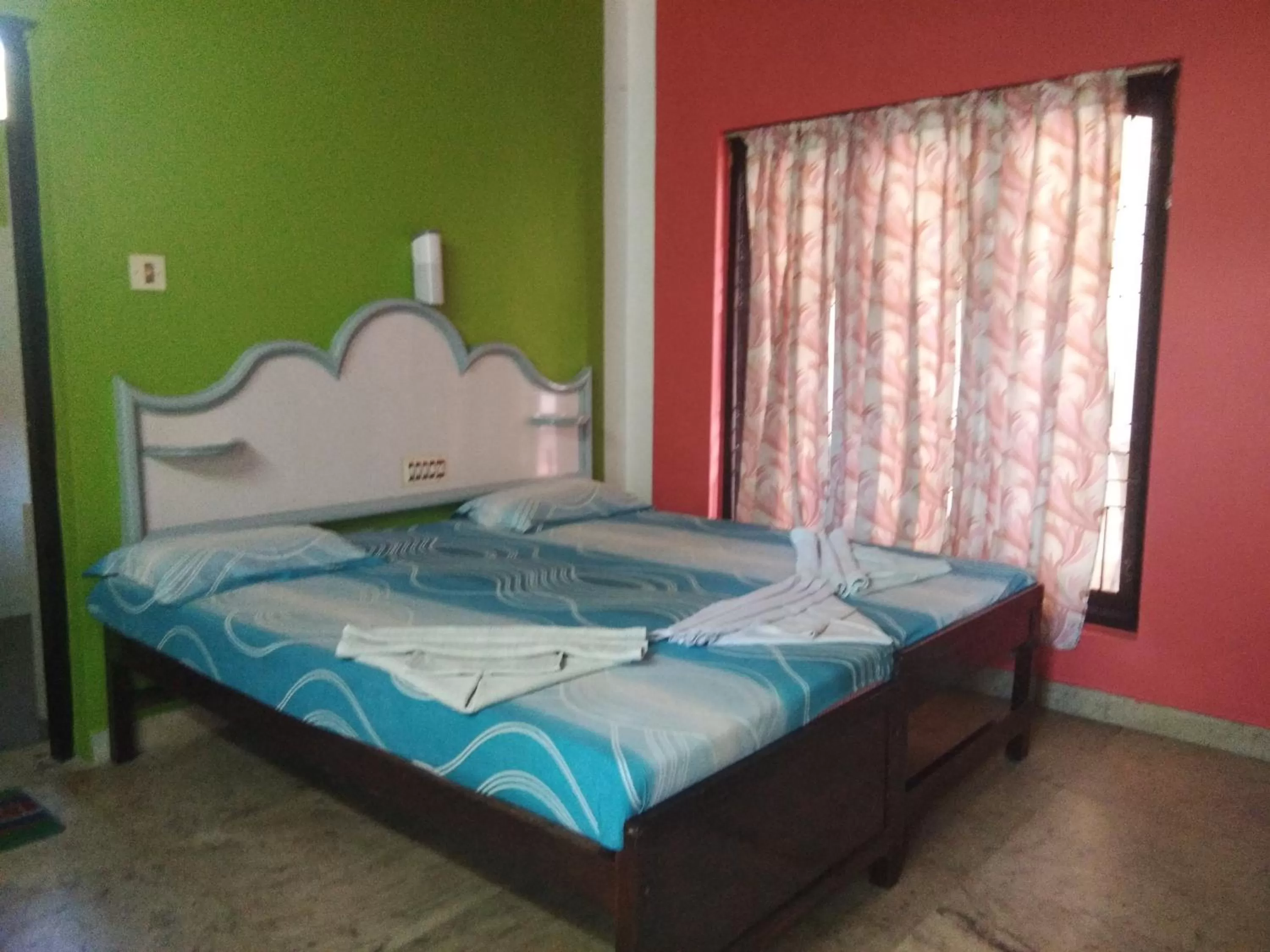 Bed in Wilson Ayurvedic Beach Resorts