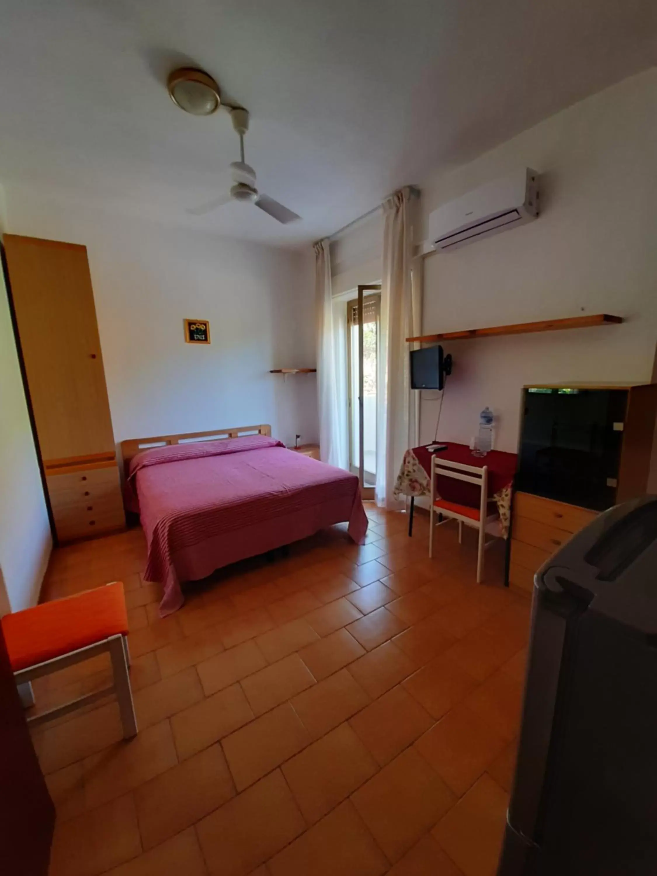 Bedroom in Hotel Conca d'Oro