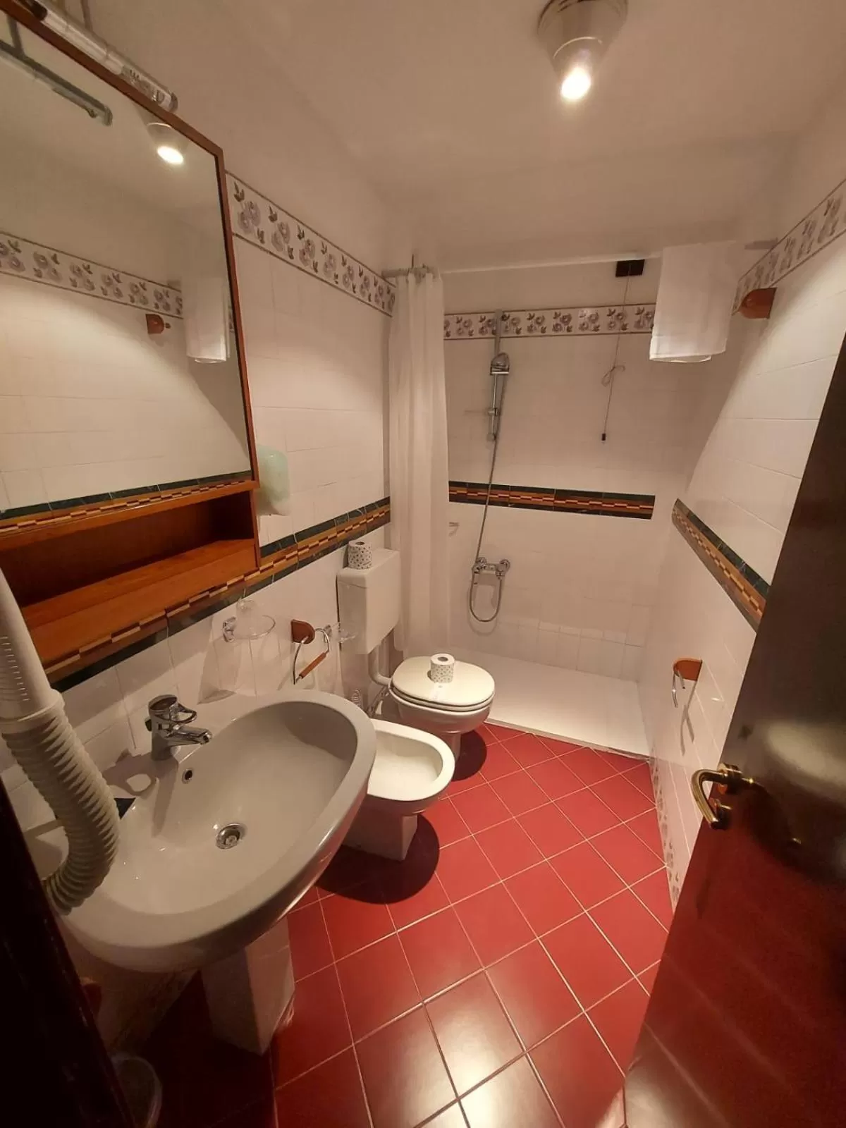 Bathroom in HG Hotel Italia