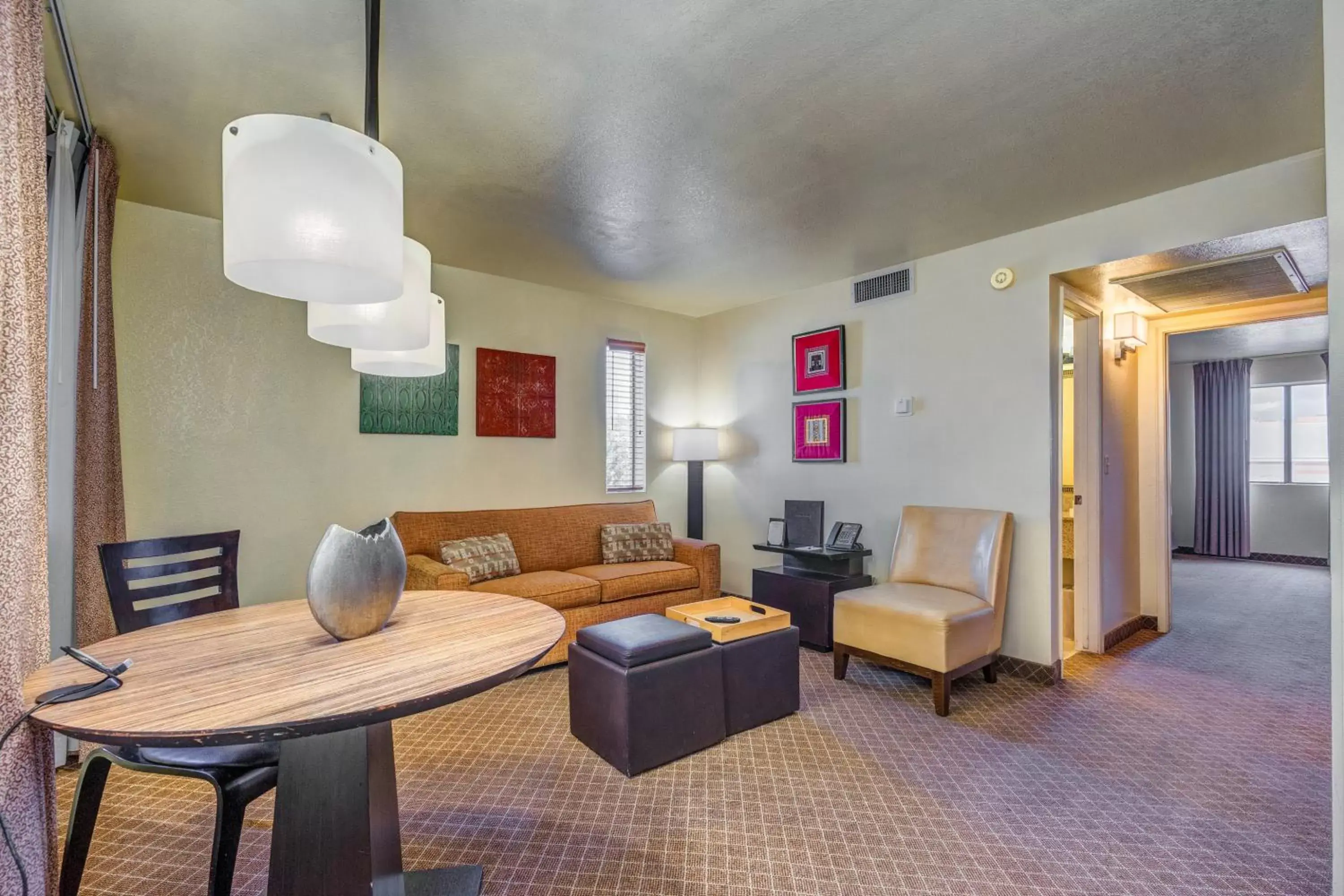 Bedroom, Seating Area in Sierra Suites Boutique Hotel