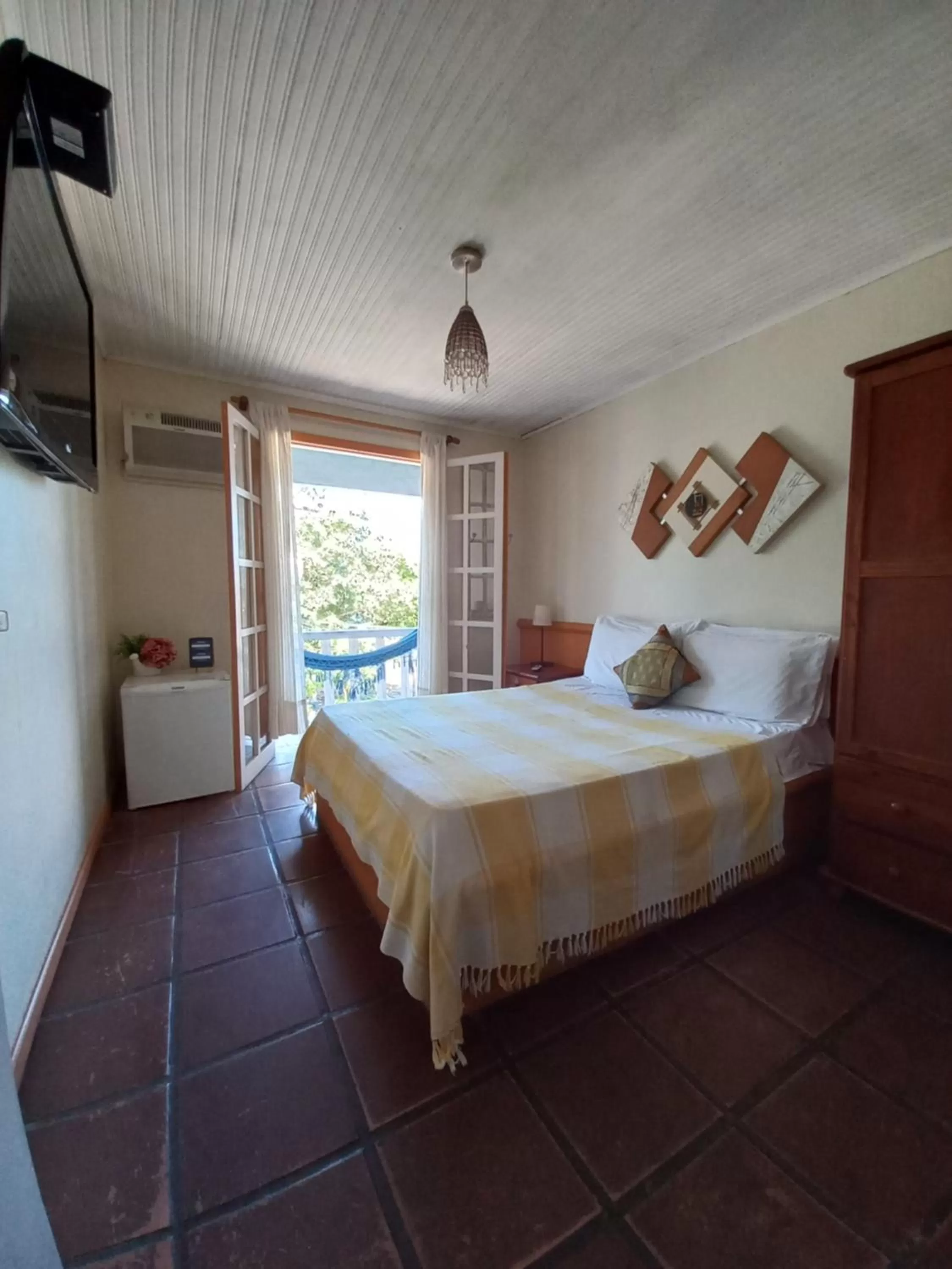 Bed in Pousada L'escale