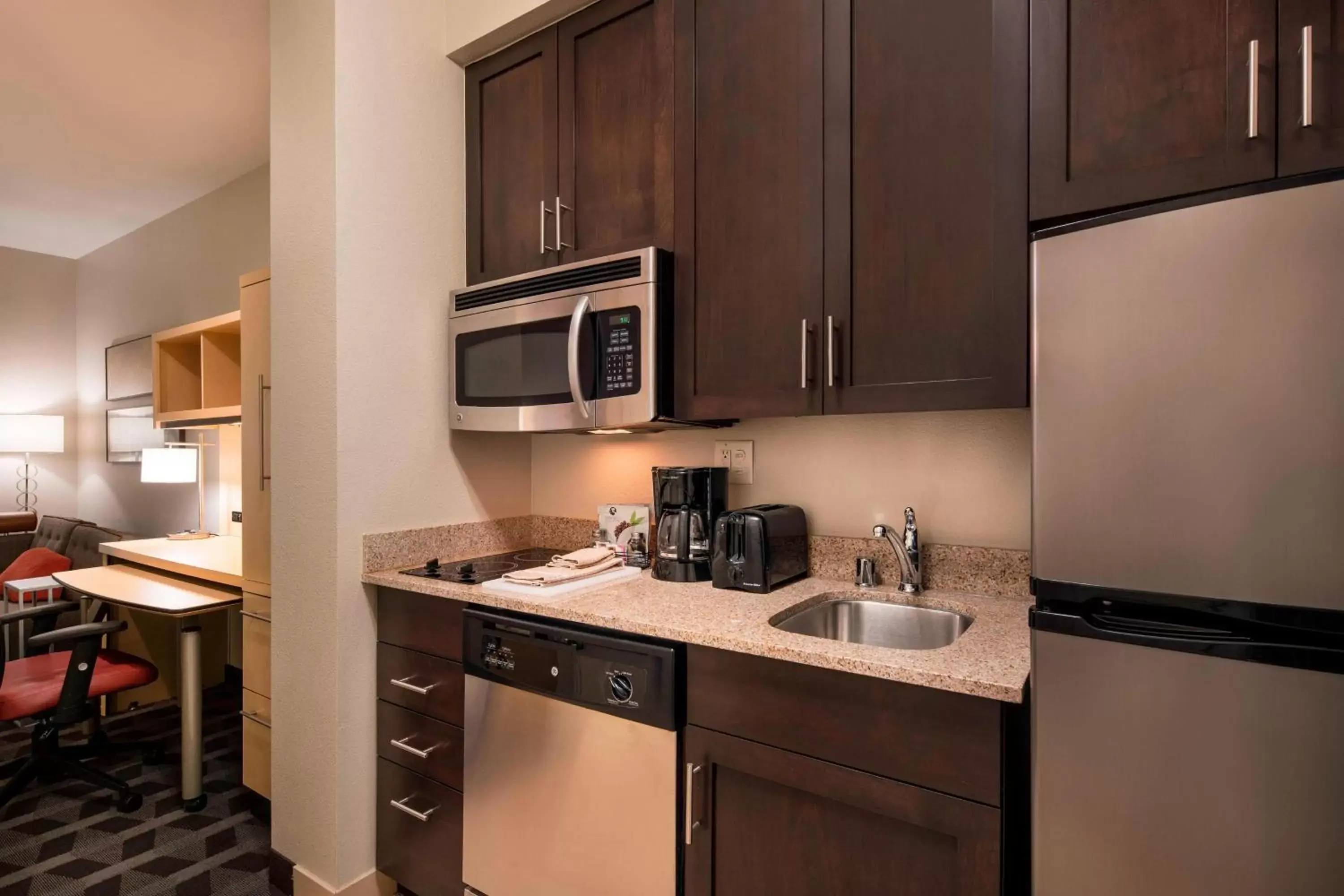 Bedroom, Kitchen/Kitchenette in TownePlace Suites by Marriott San Diego Carlsbad / Vista