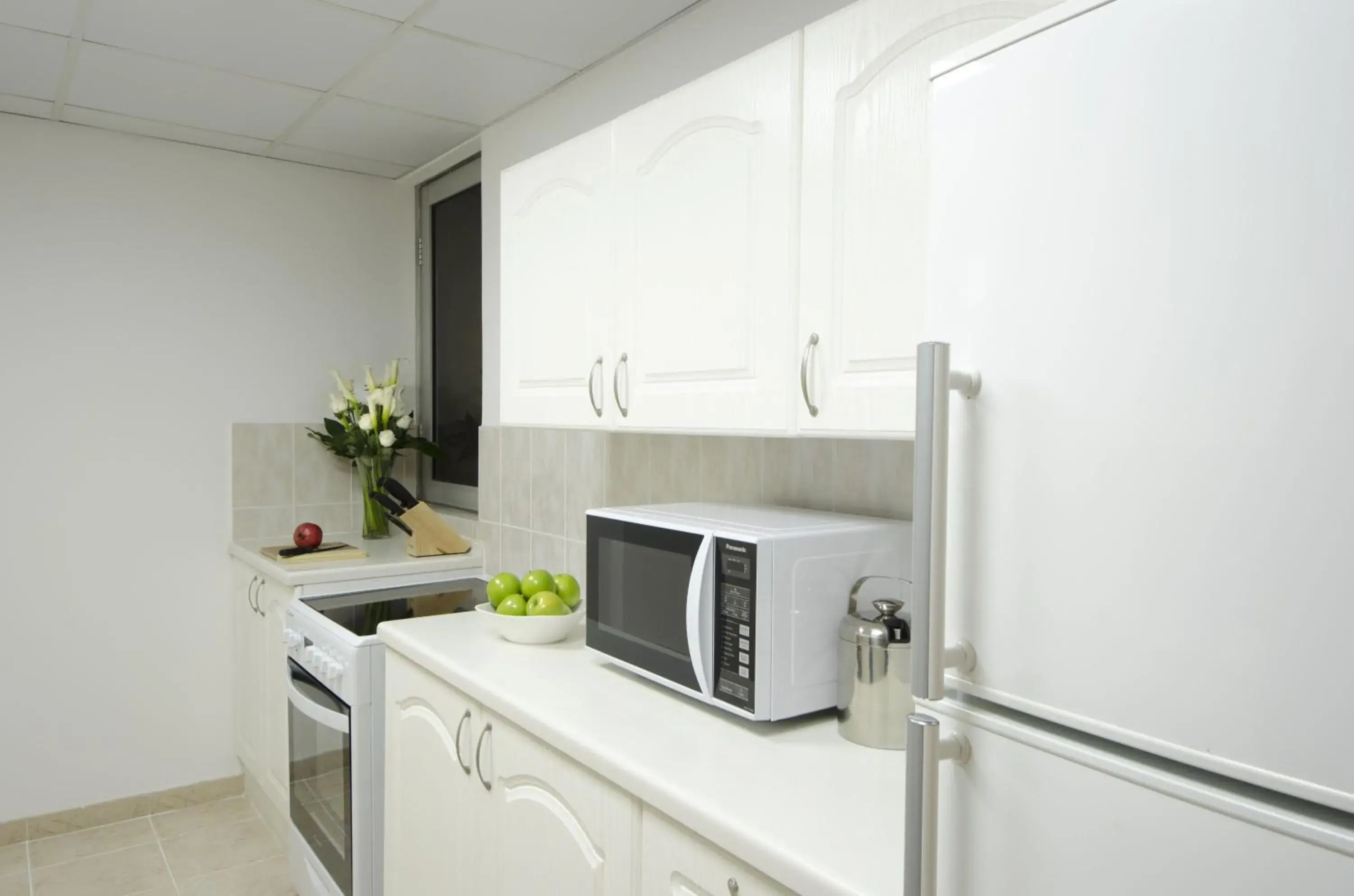 Kitchen or kitchenette, Kitchen/Kitchenette in The Apartments, Dubai World Trade Centre Hotel Apartments