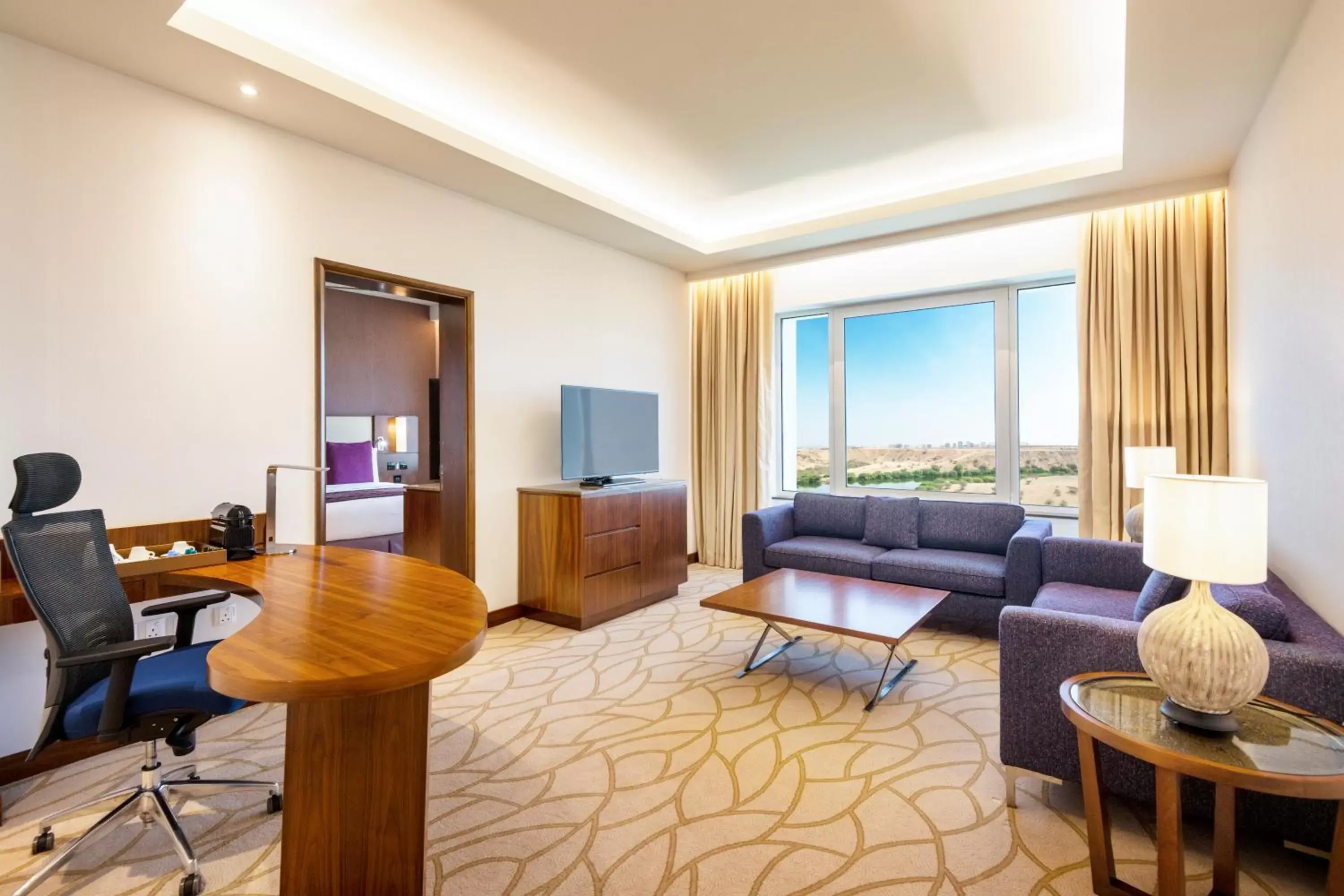 Living room, Seating Area in Crowne Plaza Muscat OCEC, an IHG Hotel