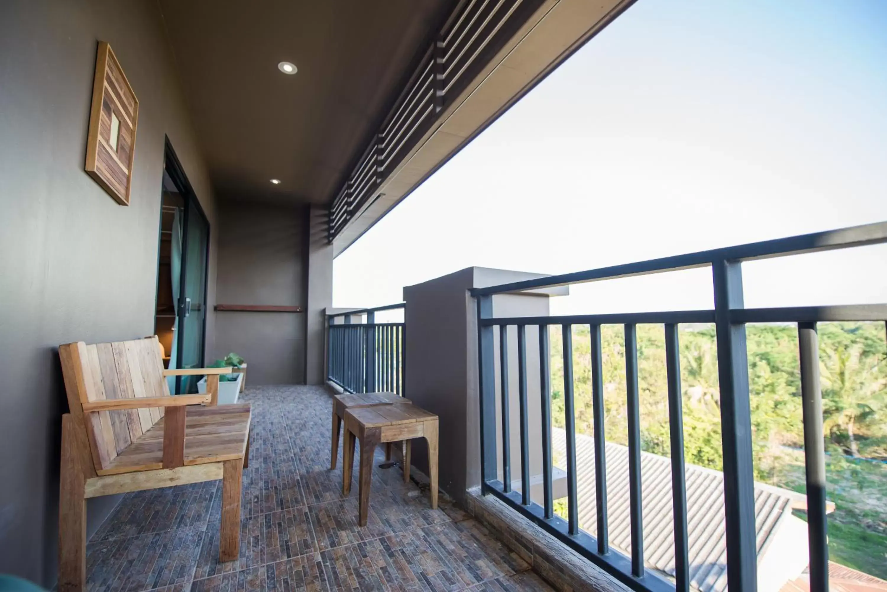 Balcony/Terrace in Brown House Hotel by Blu Monkey - SHA Extra Plus