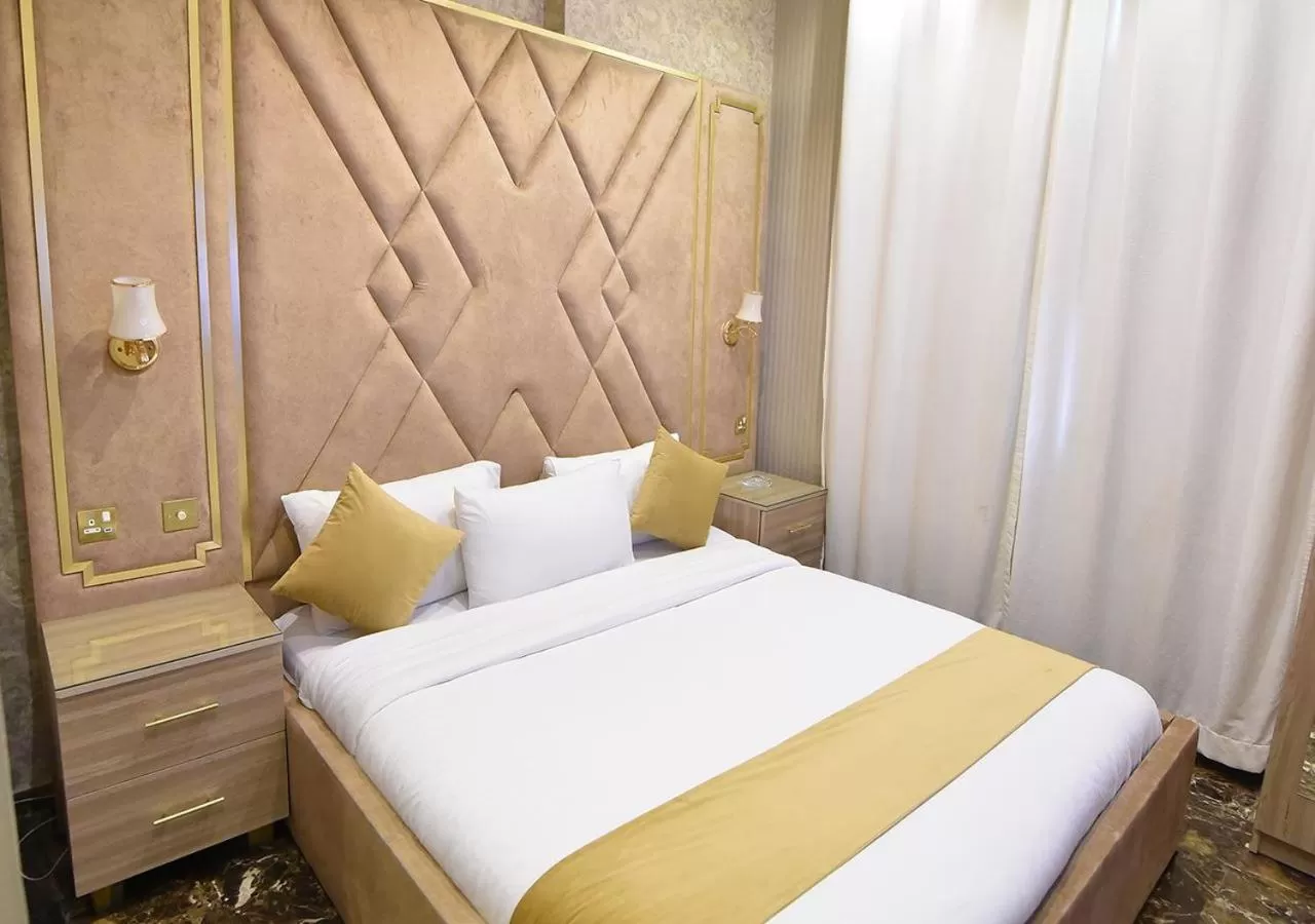 Bed in Rihanna Hotel Apartment