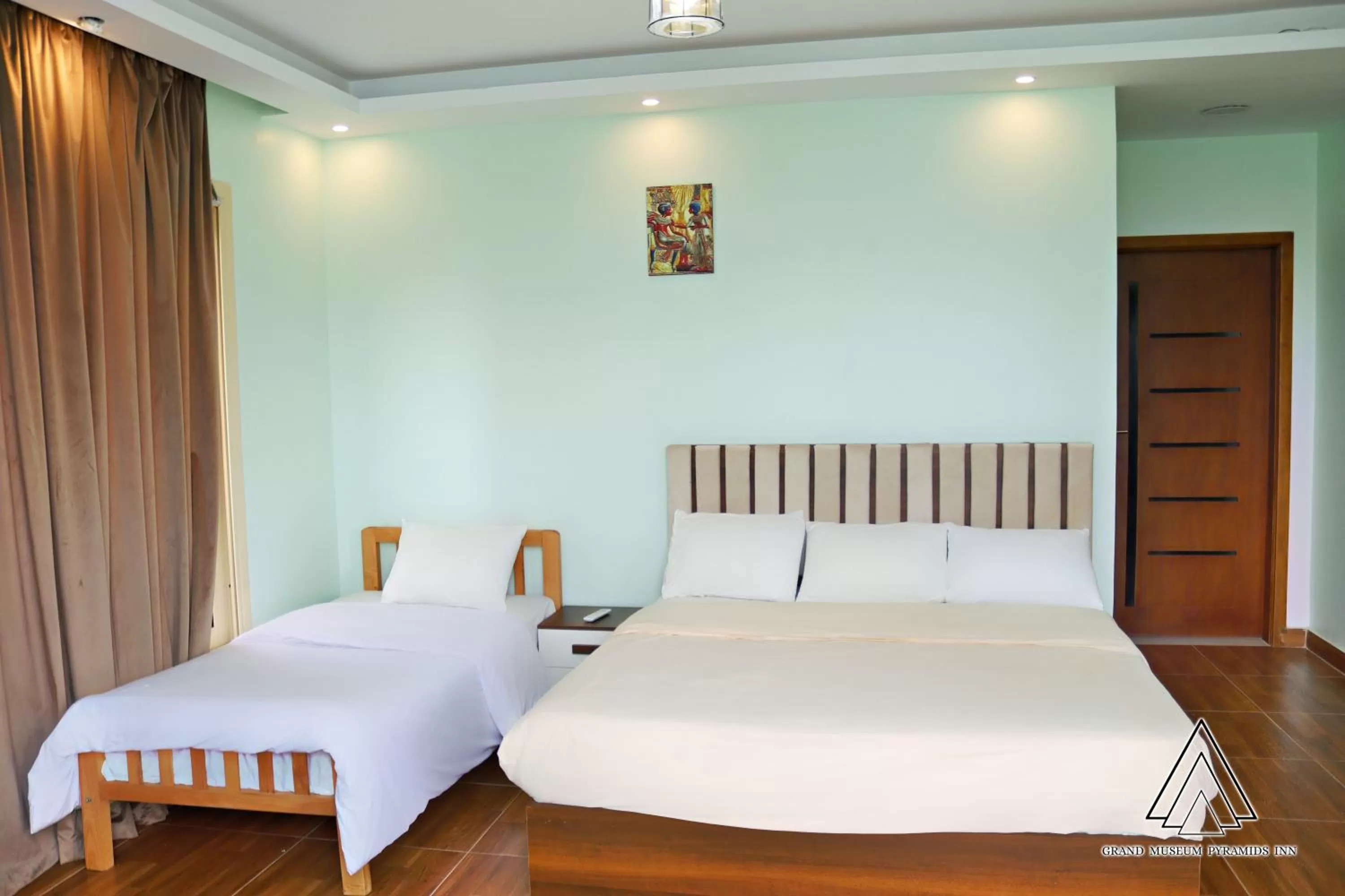 Bed in Grand Museum Pyramids Inn