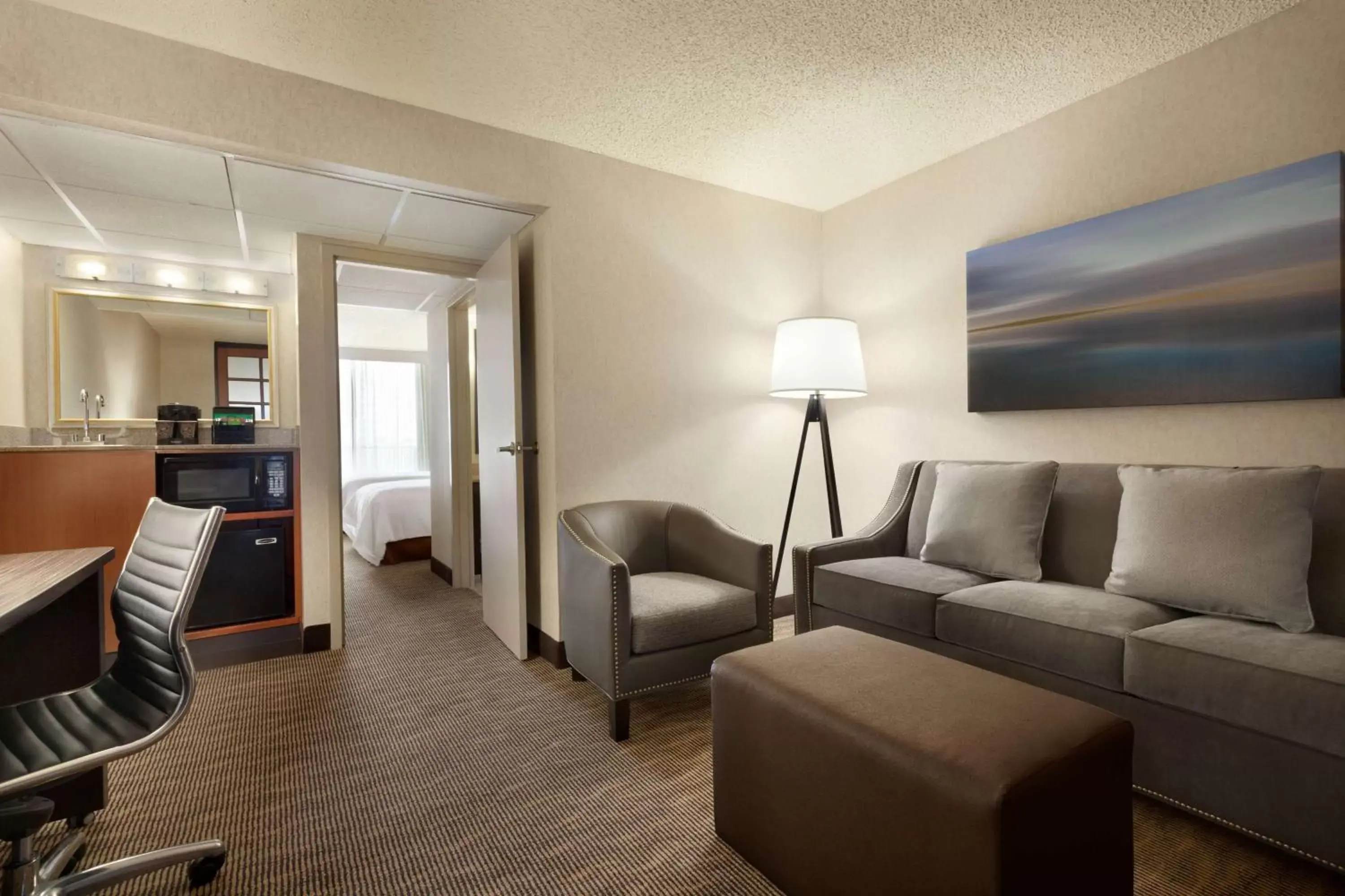 Bedroom, Seating Area in Embassy Suites by Hilton Oklahoma City Will Rogers Airport