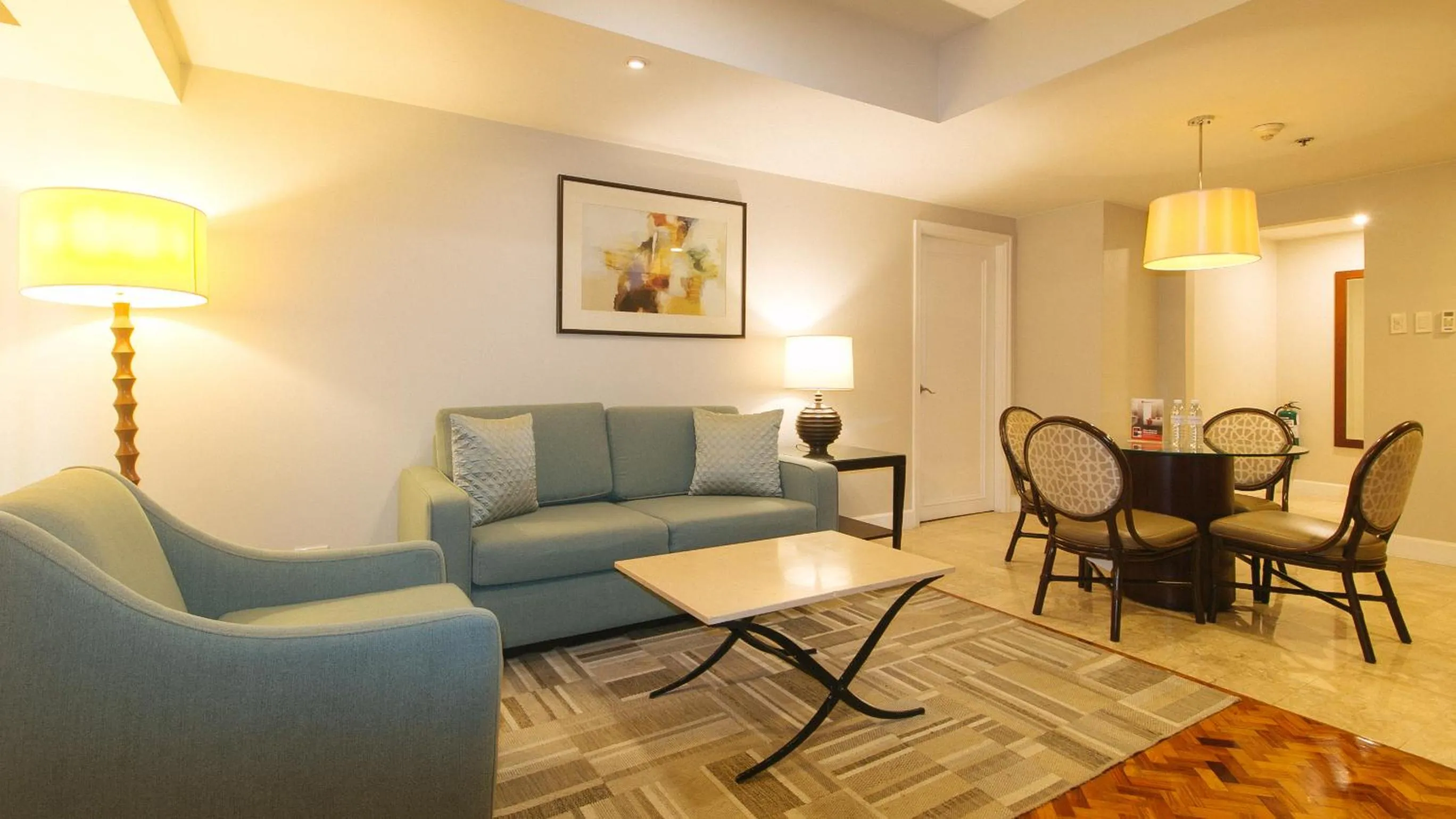 Seating area in RedDoorz Premium at The Residences Olympia Makati