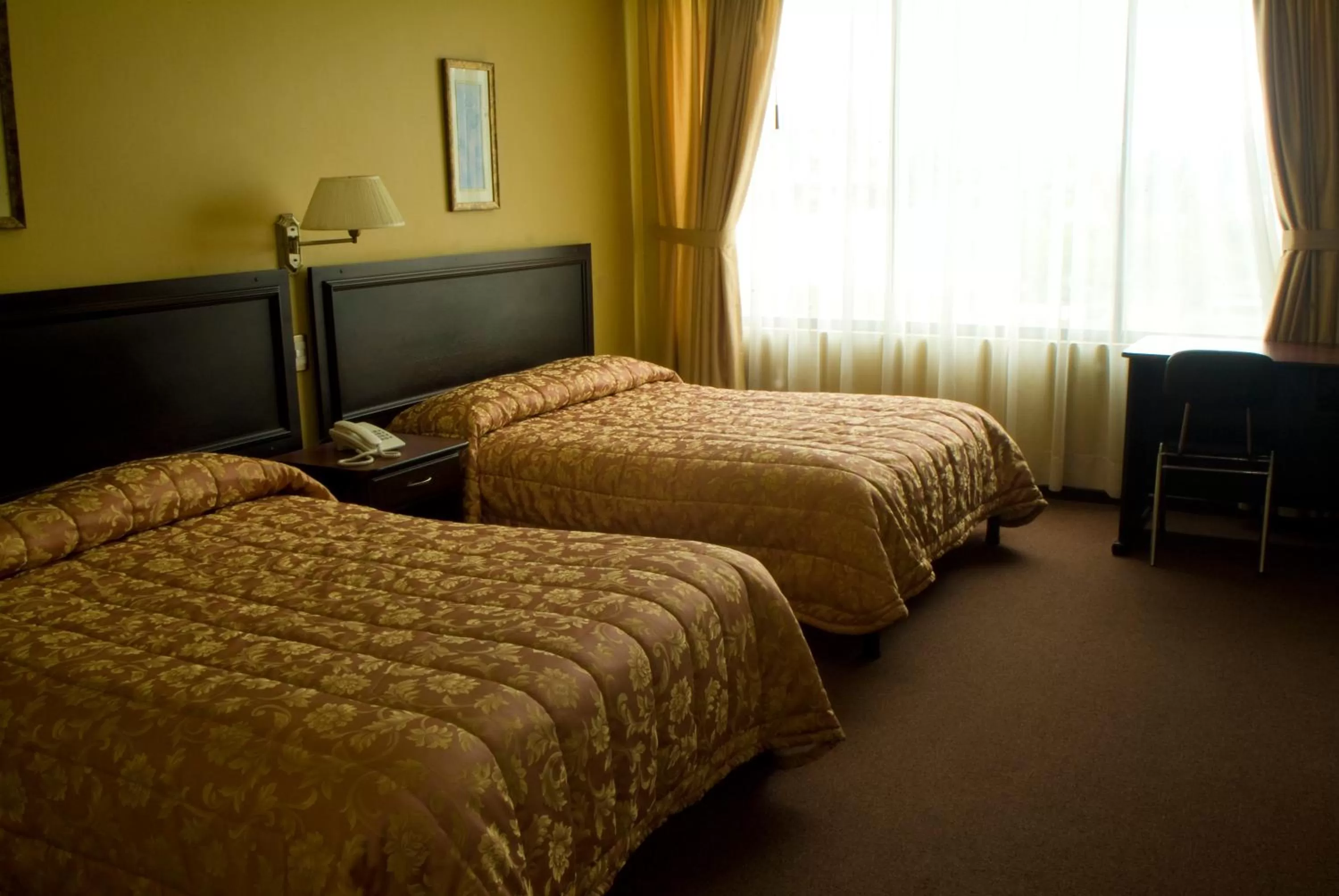 Decorative detail, Bed in Hotel Podocarpus