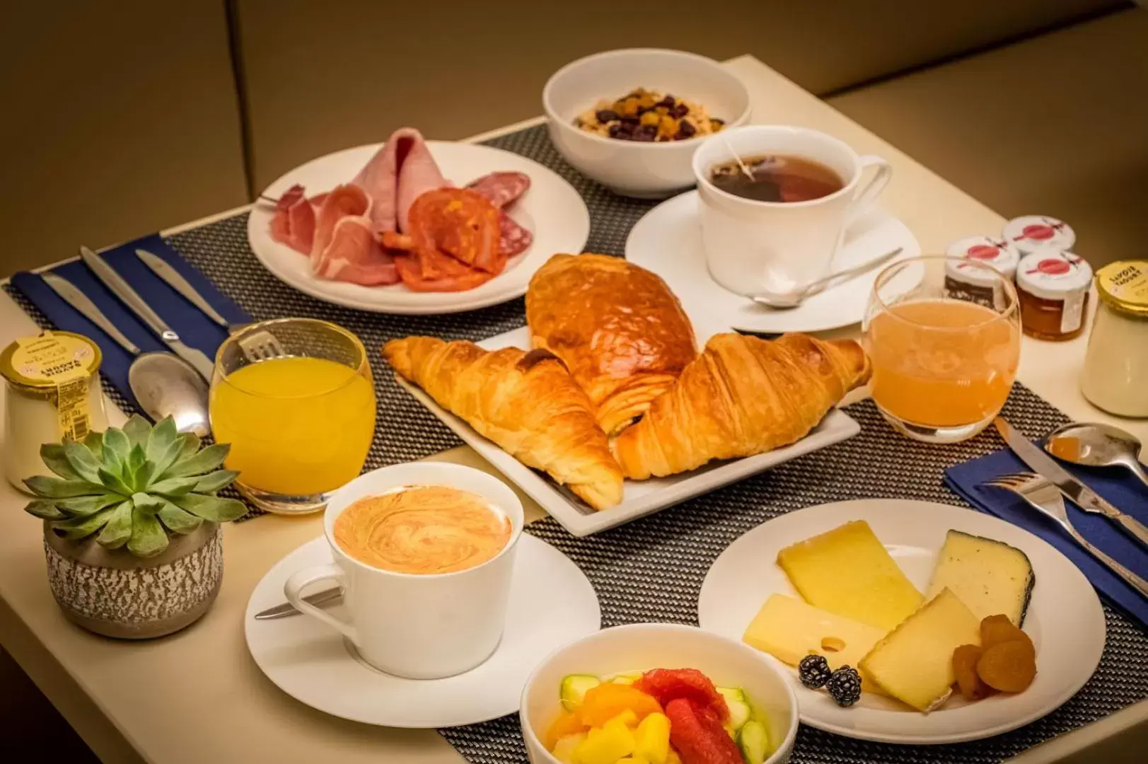 Breakfast in Hôtel Le Tourville by Inwood Hotels