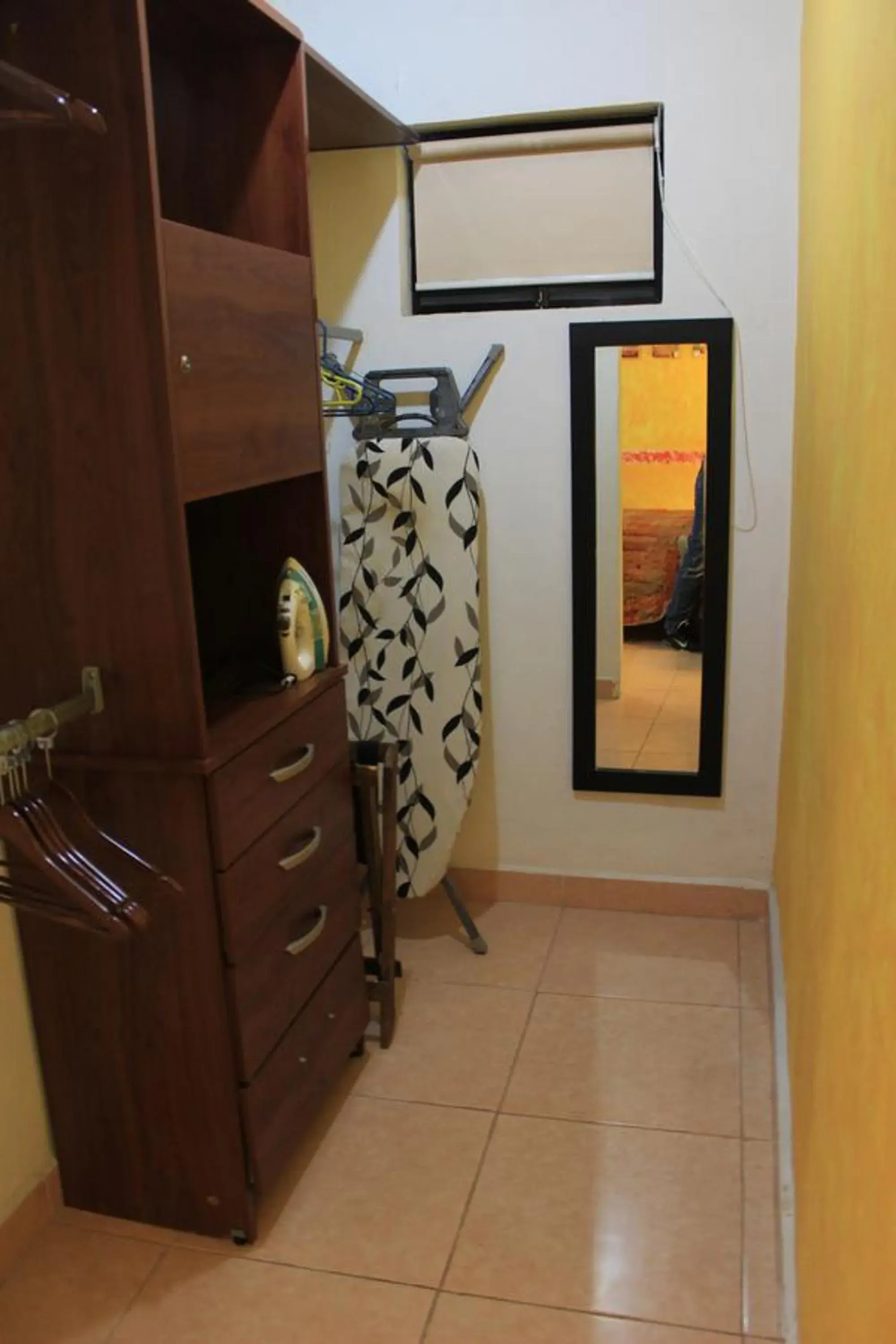 Decorative detail, TV/Entertainment Center in Terracota Corner Rooms