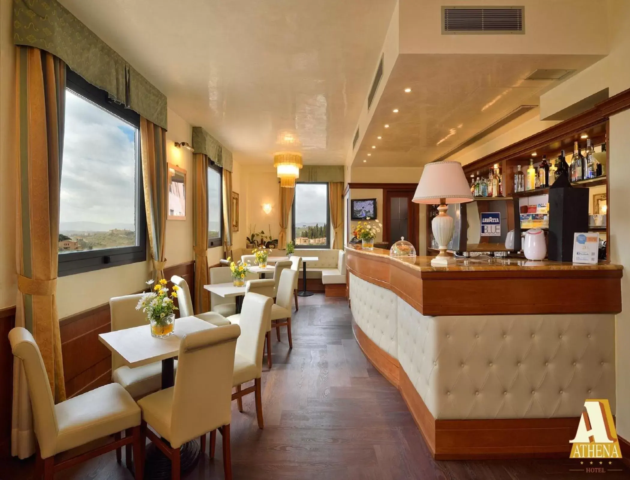 Lounge or bar in Hotel Athena Lounge or bar in Hotel Athena